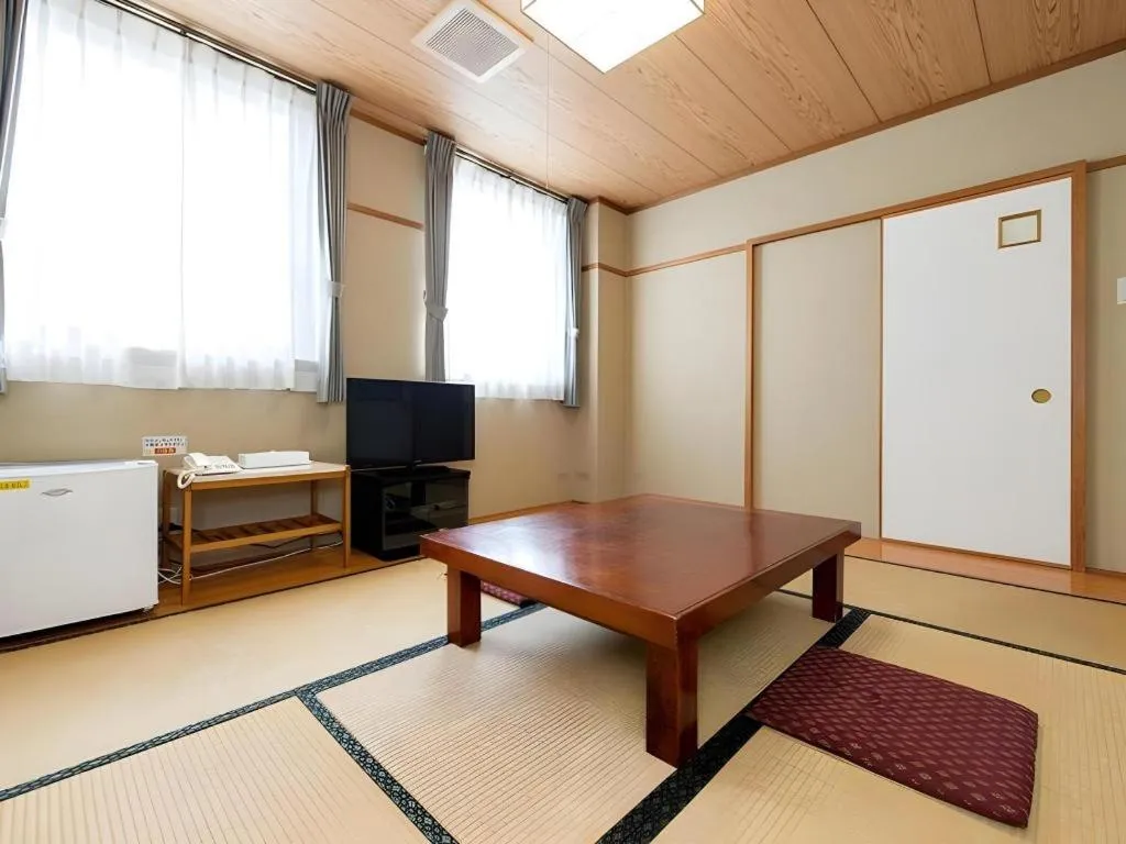 Bed in New Biwako Hotel