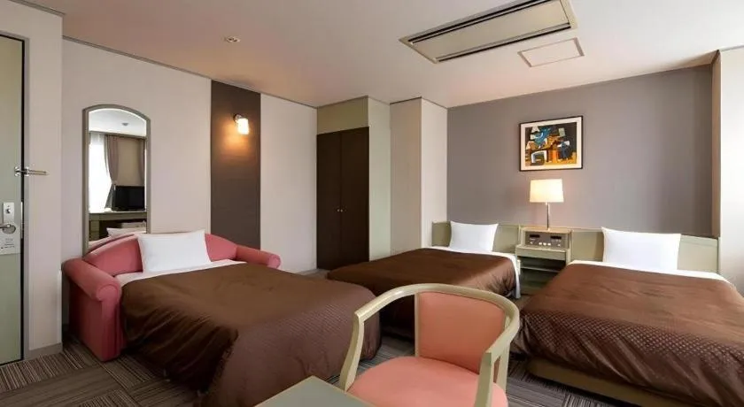 Bed in New Biwako Hotel