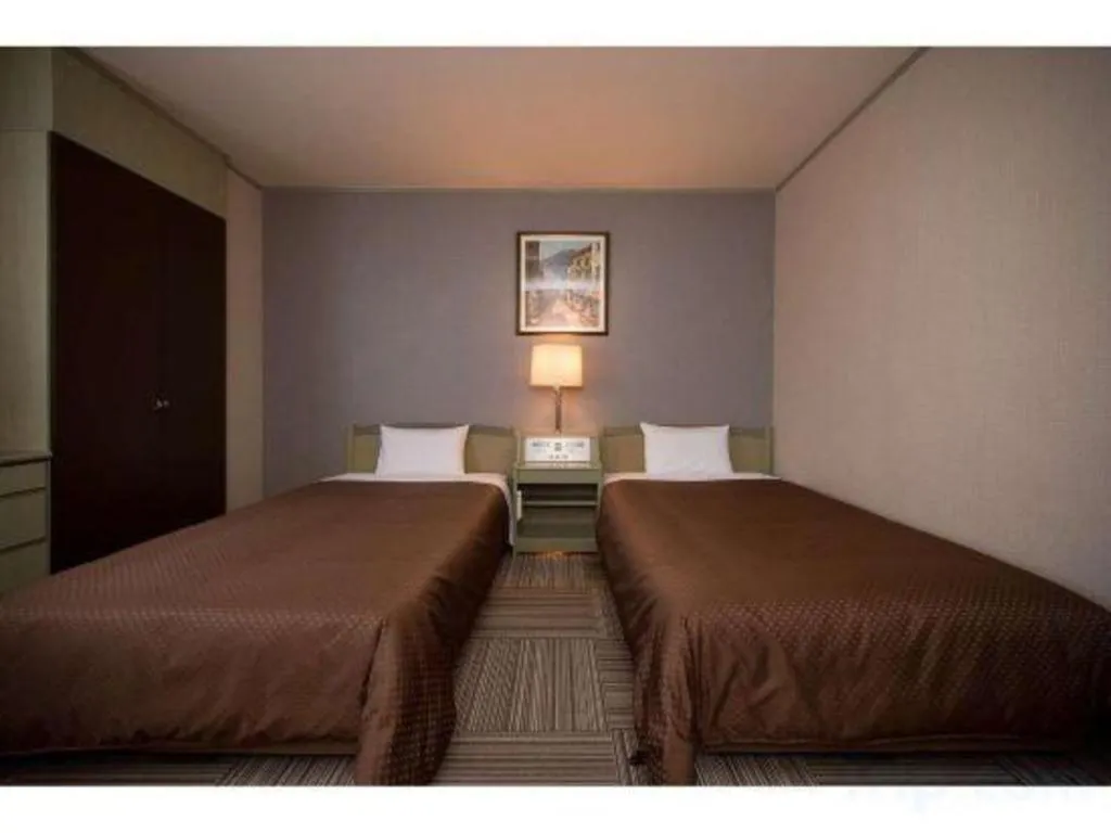 Bed in New Biwako Hotel