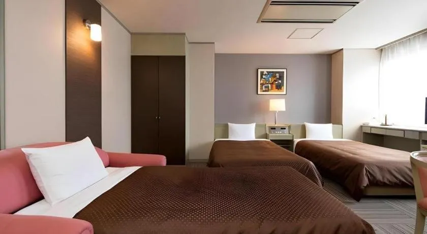 Bed in New Biwako Hotel