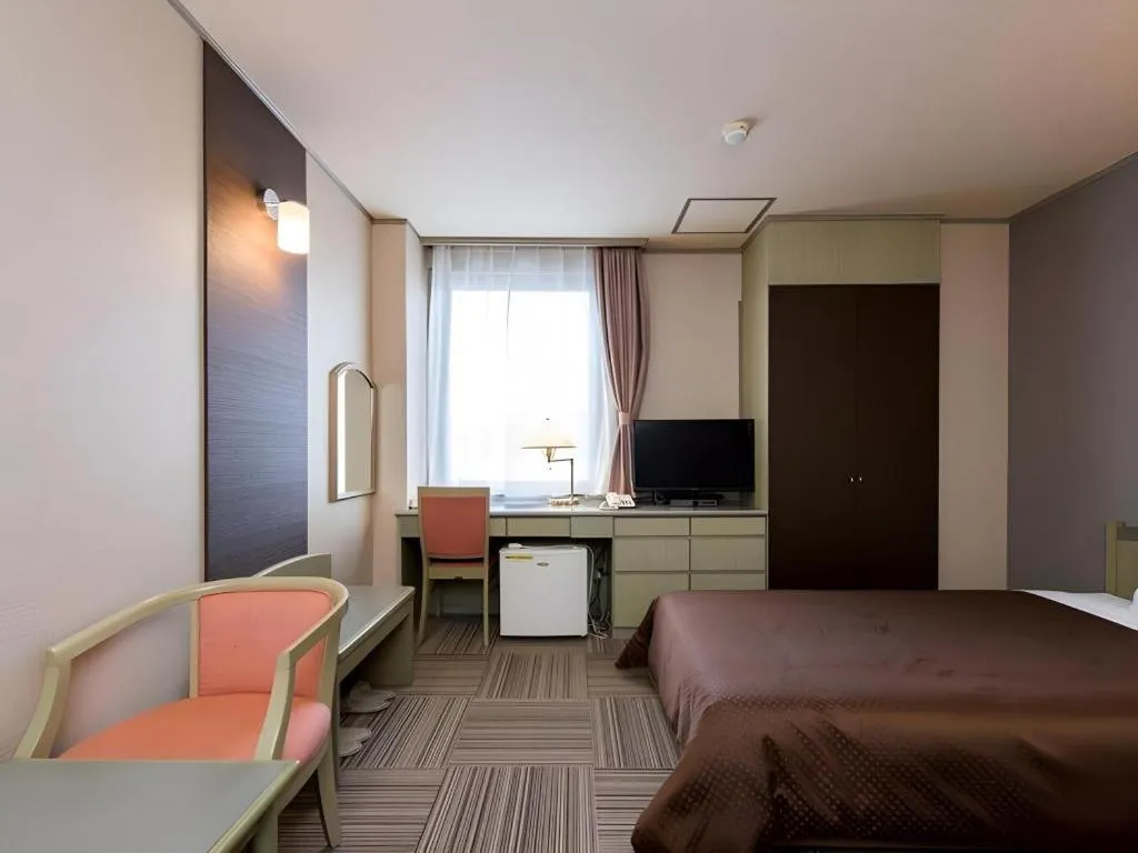 Bed in New Biwako Hotel