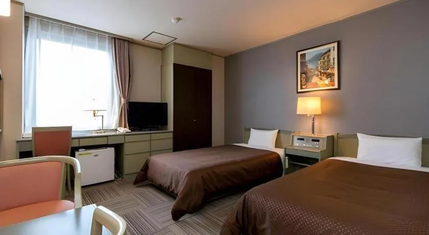 Bed in New Biwako Hotel