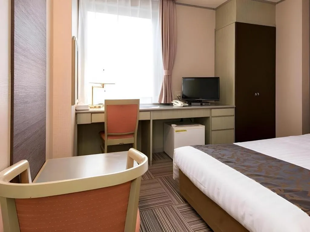 Bed in New Biwako Hotel