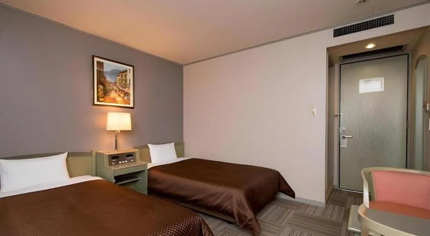 Bed in New Biwako Hotel