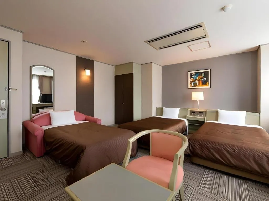 Bed in New Biwako Hotel