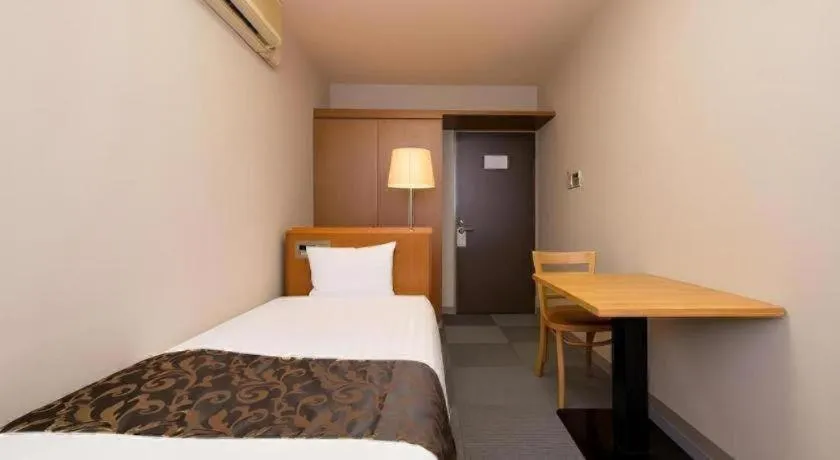 Bed in New Biwako Hotel