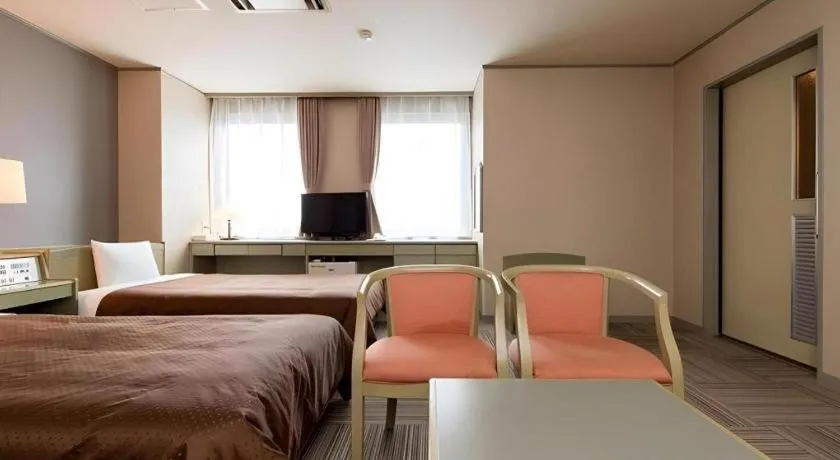 Bed in New Biwako Hotel