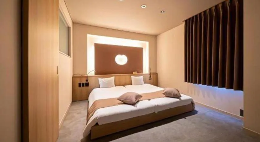 Bed in New Biwako Hotel