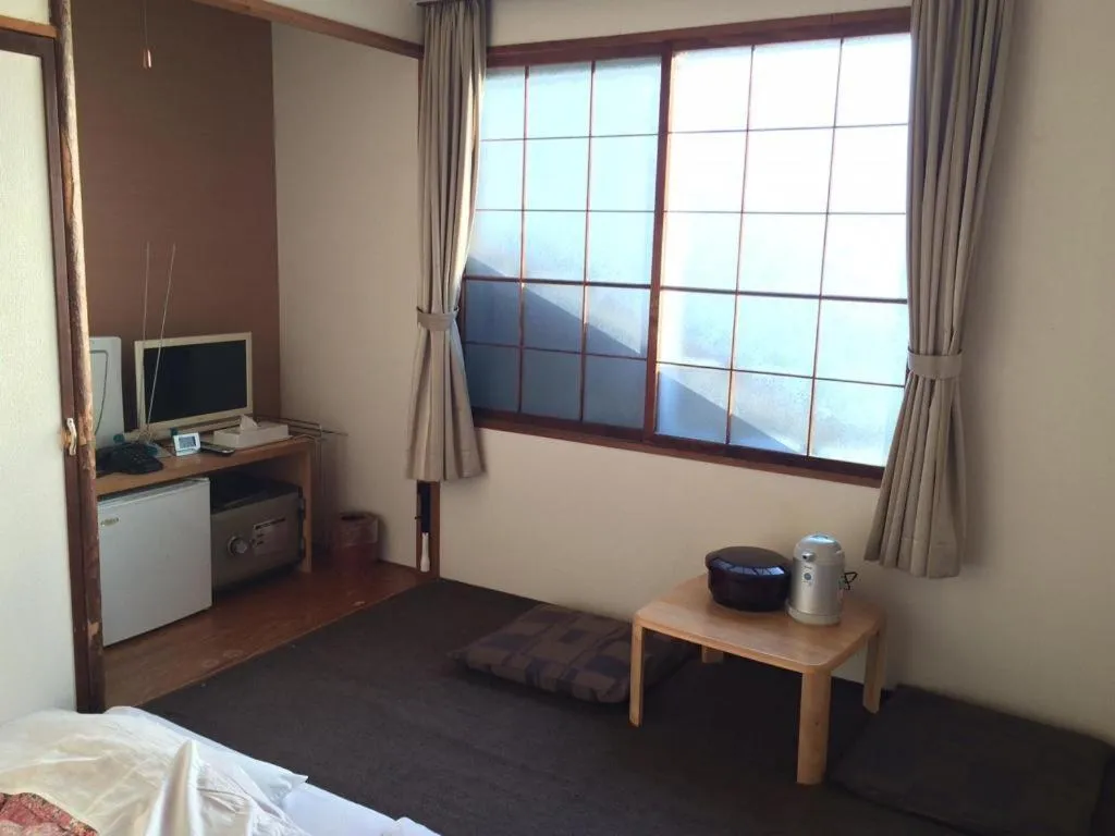 Bed in Hotel Kikuya