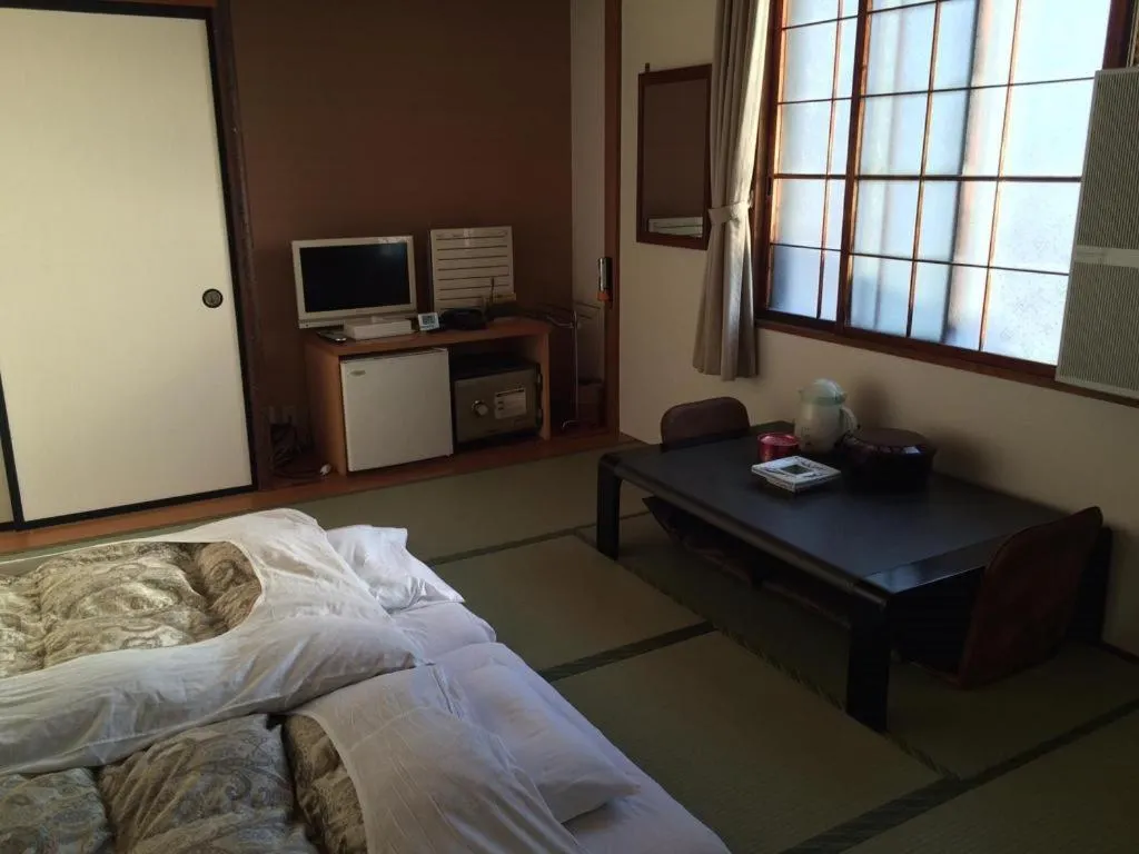 Bed in Hotel Kikuya