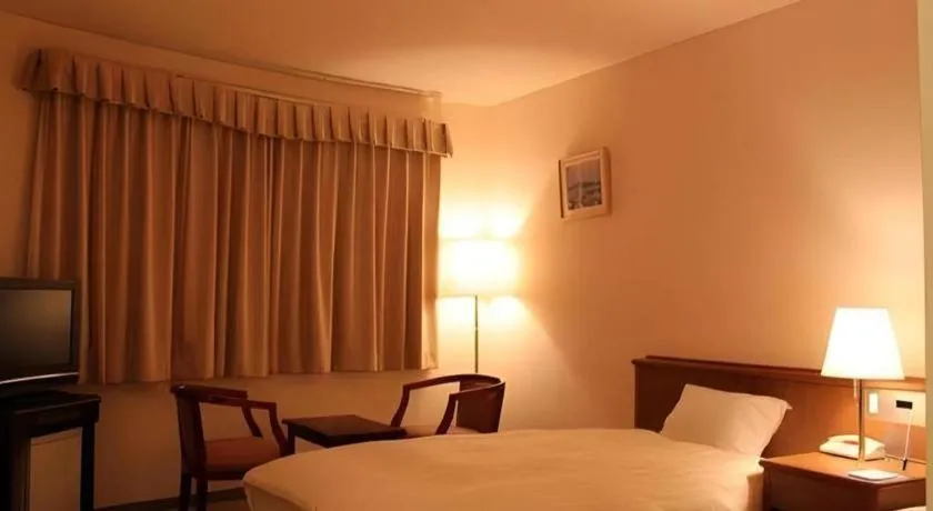 Bed in Kamisuwa Station Hotel