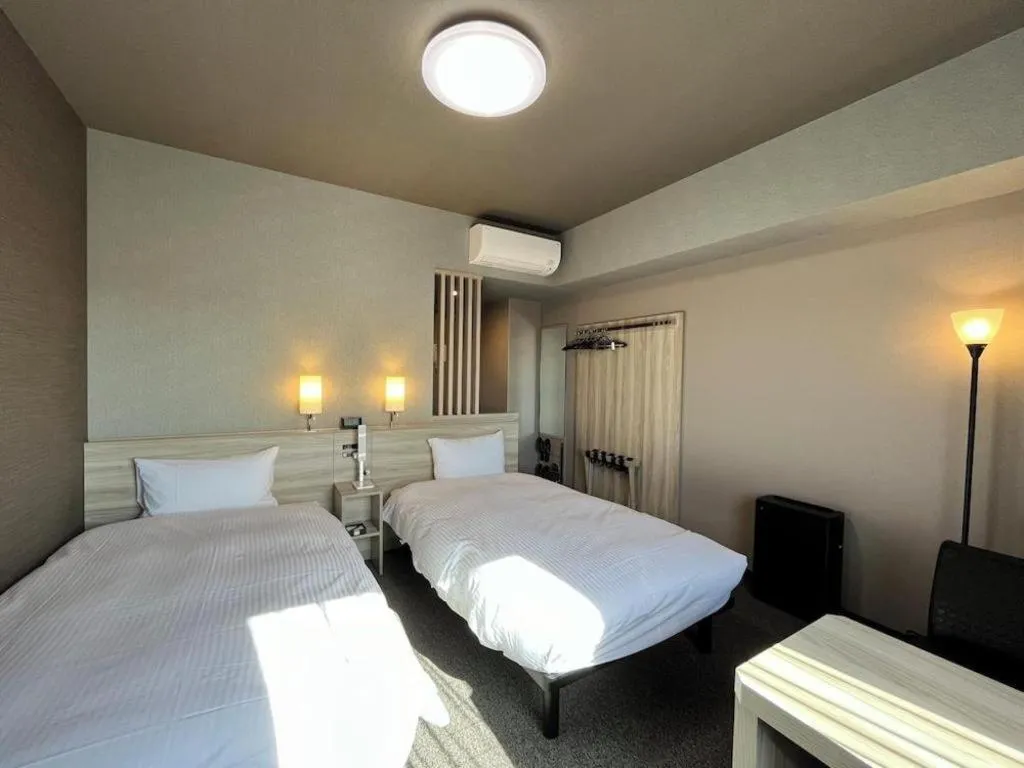 Bed in Hotel Route Inn Miyakonojo