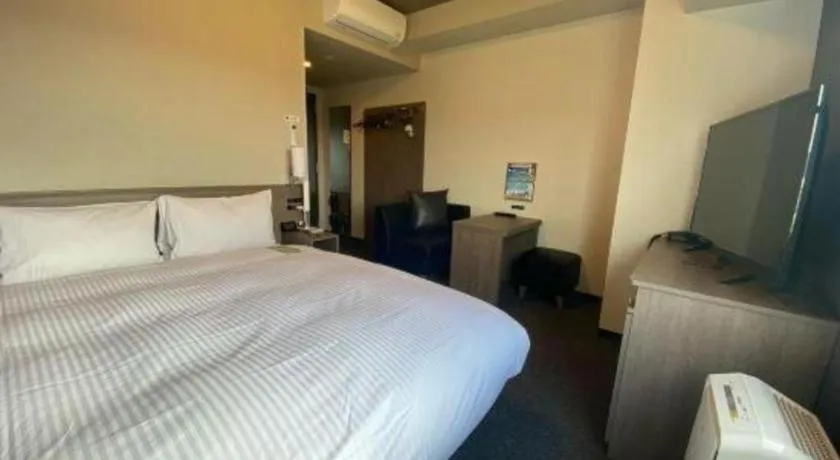 Bed in Hotel Route Inn Miyakonojo