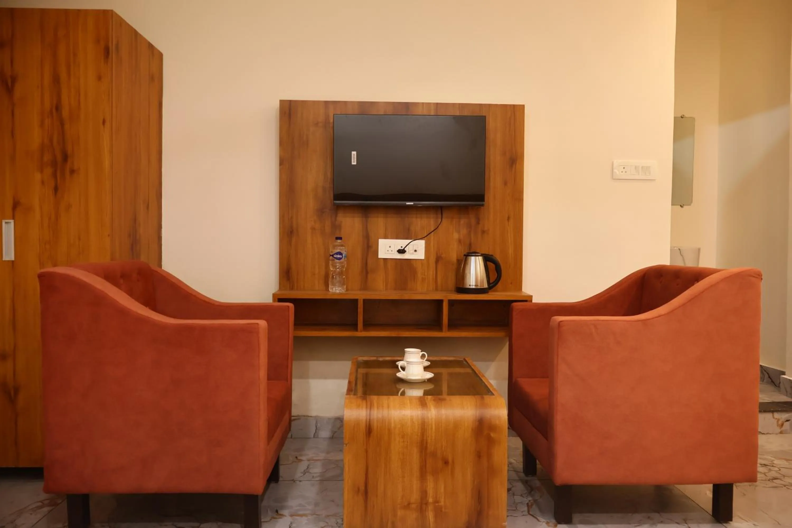 Communal lounge/ TV room in The Rajputana Palace