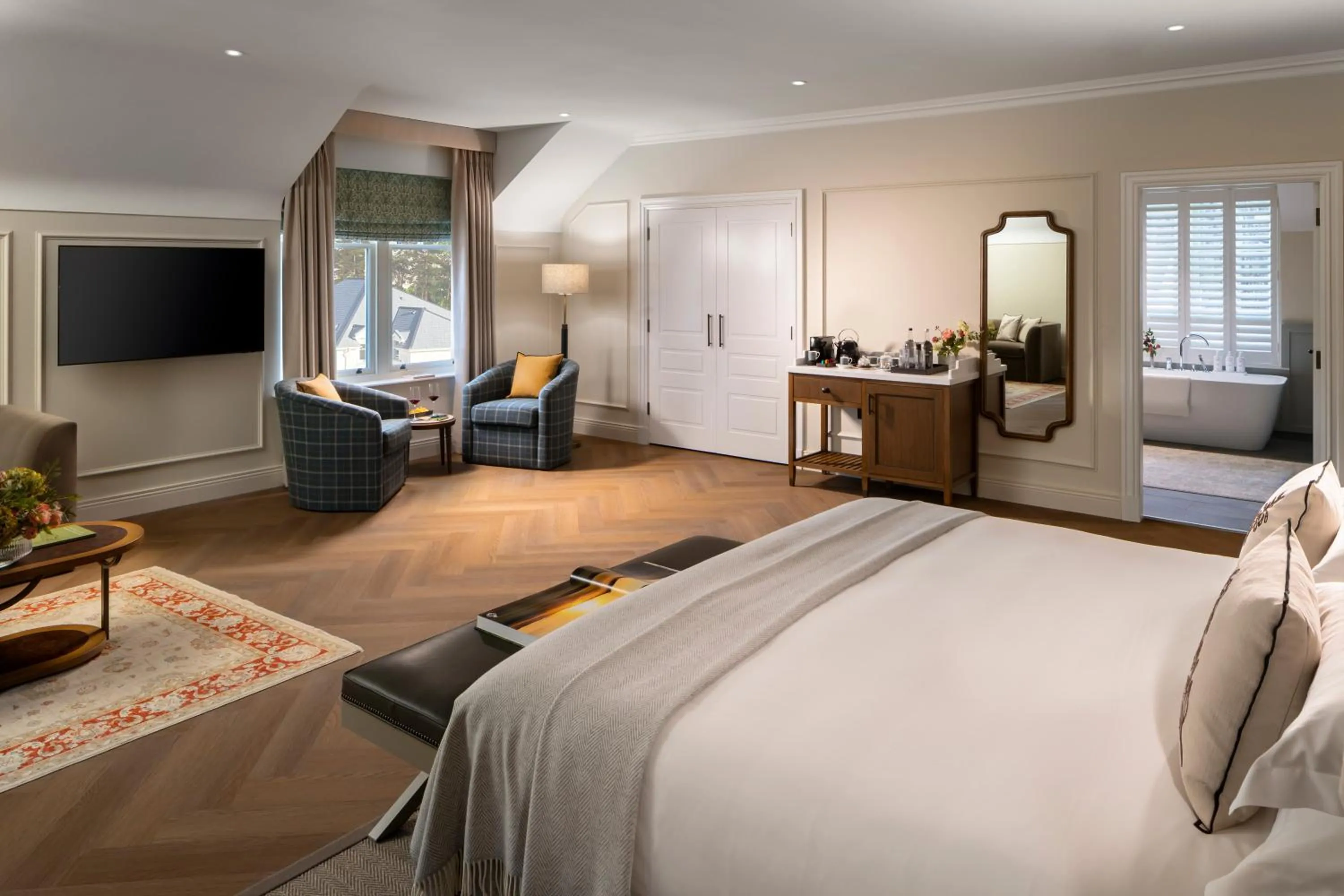 Seating area, Bed in Dunluce Lodge - Small Luxury Hotels of the World