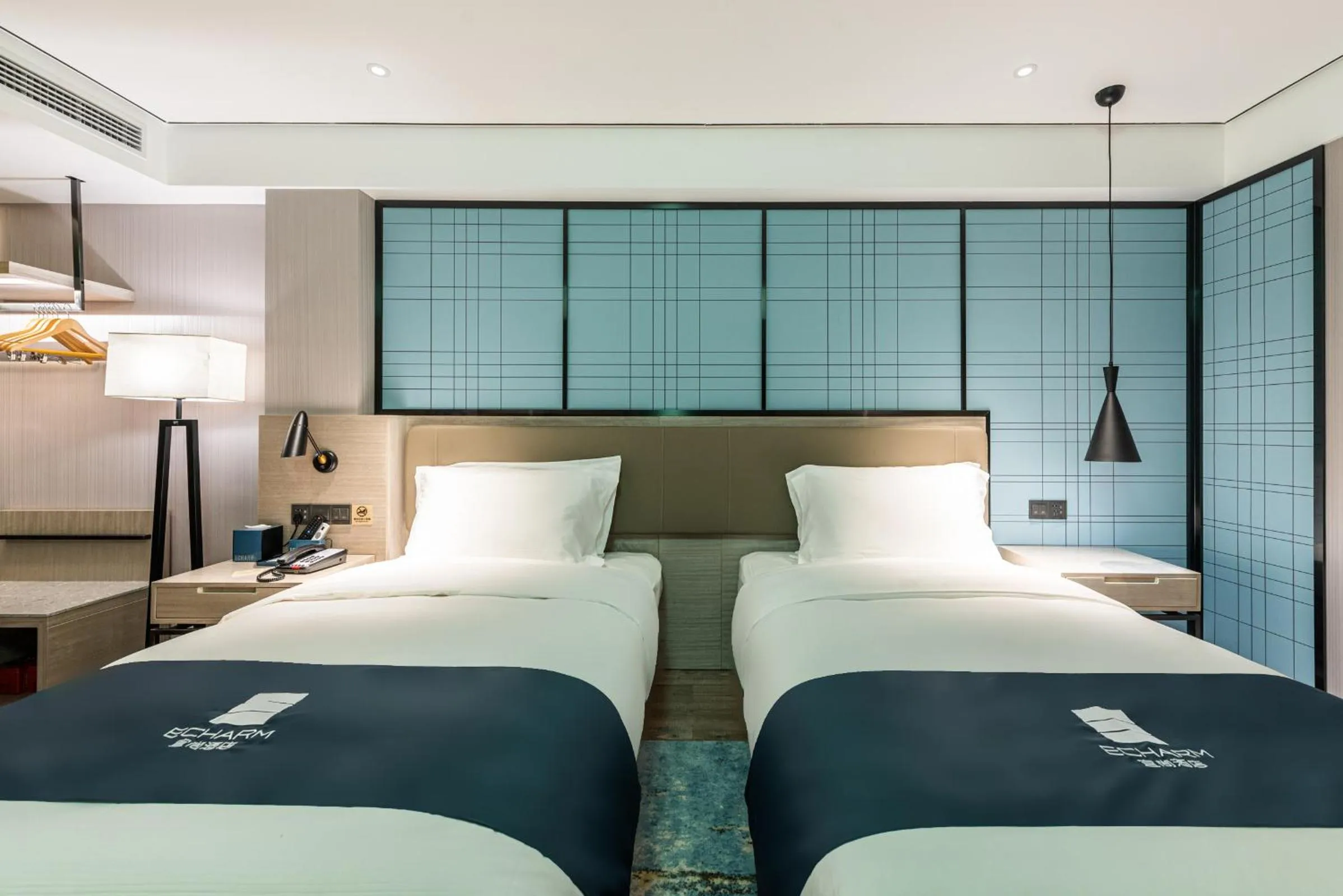 Bed in Echarm Hotel Yangshuo West Stree