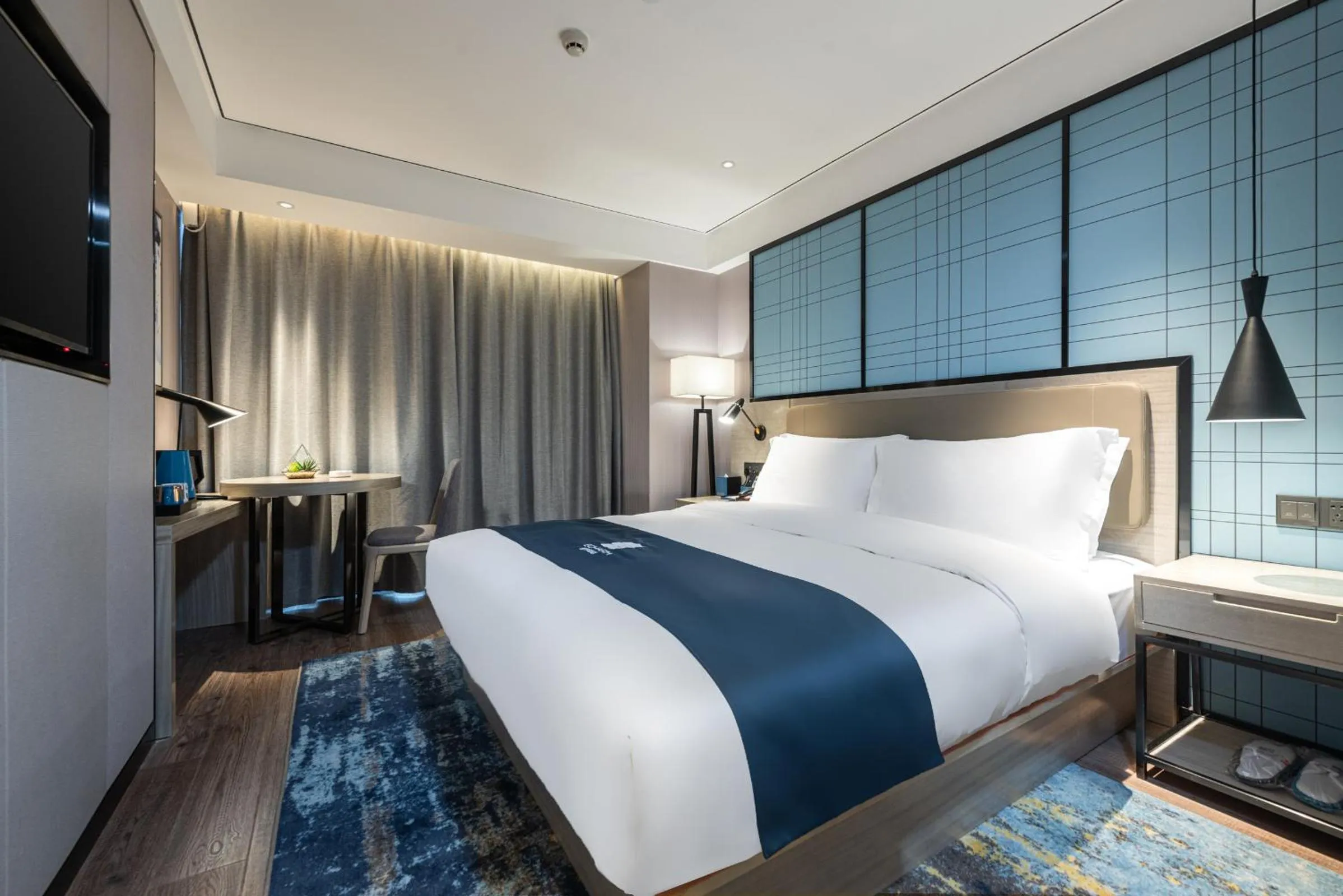 Bed in Echarm Hotel Yangshuo West Stree