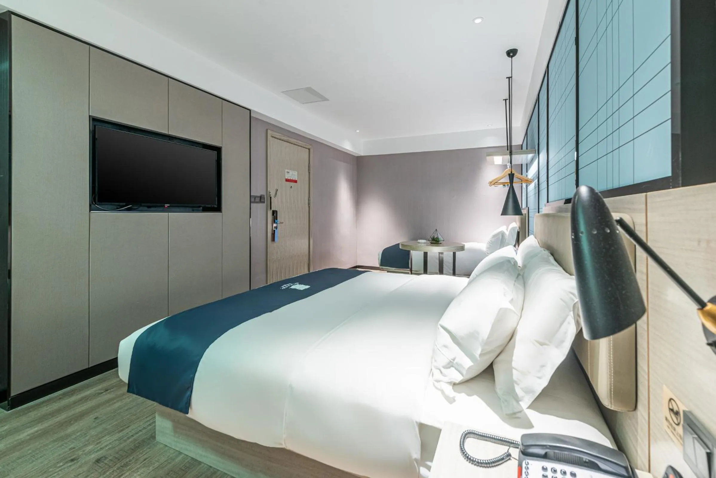 Bedroom in Echarm Hotel Yangshuo West Stree