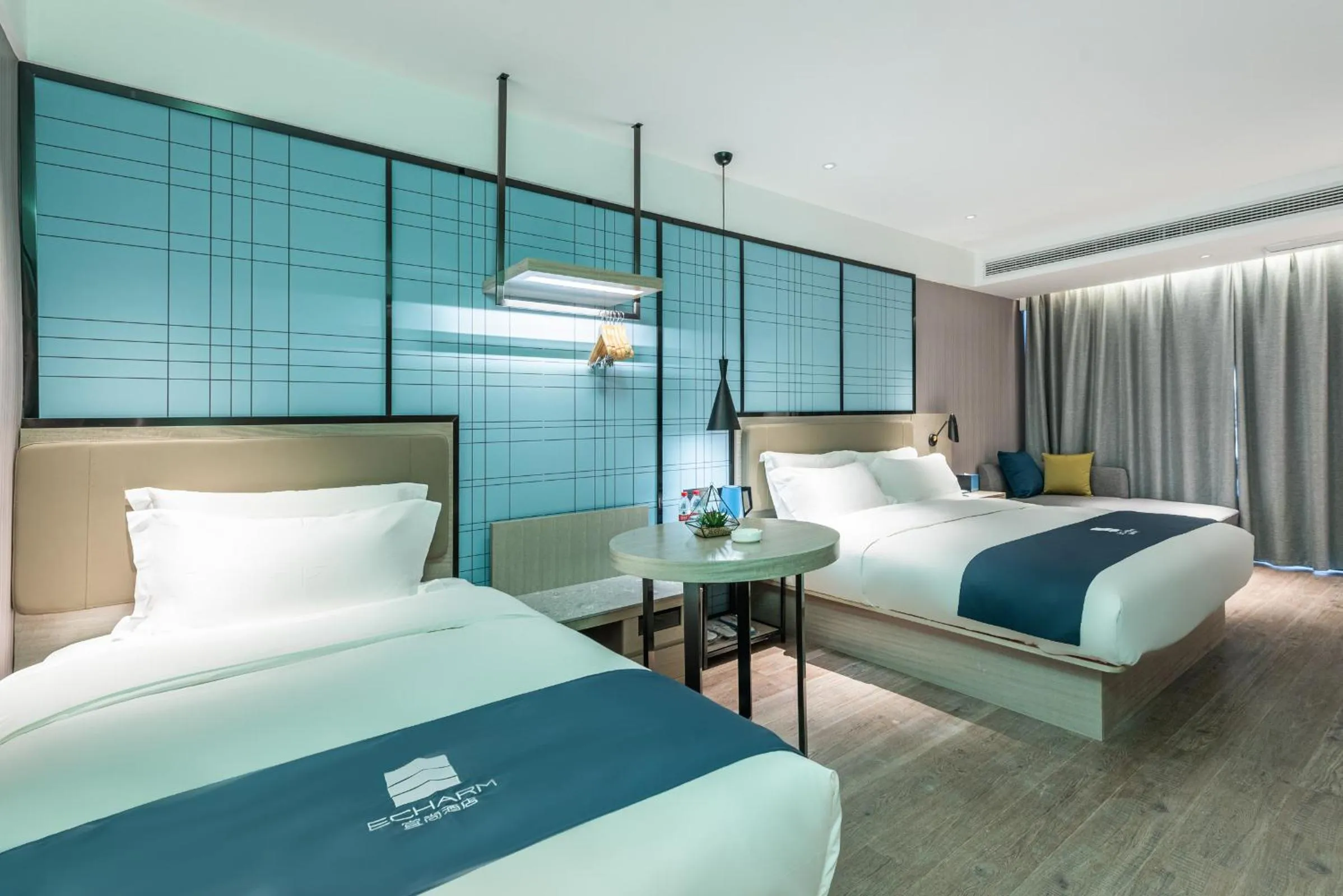 Bed in Echarm Hotel Yangshuo West Stree 宜尚酒店 阳朔西街店