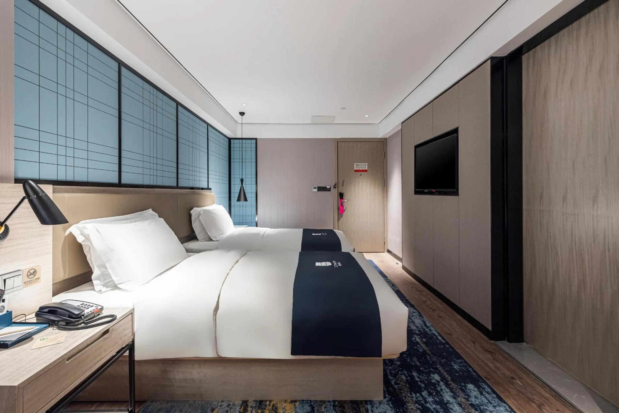 Bed in Echarm Hotel Yangshuo West Stree