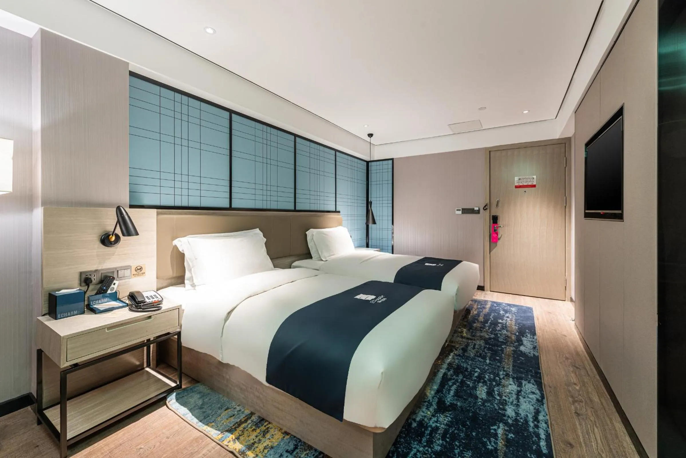 Bed in Echarm Hotel Yangshuo West Stree