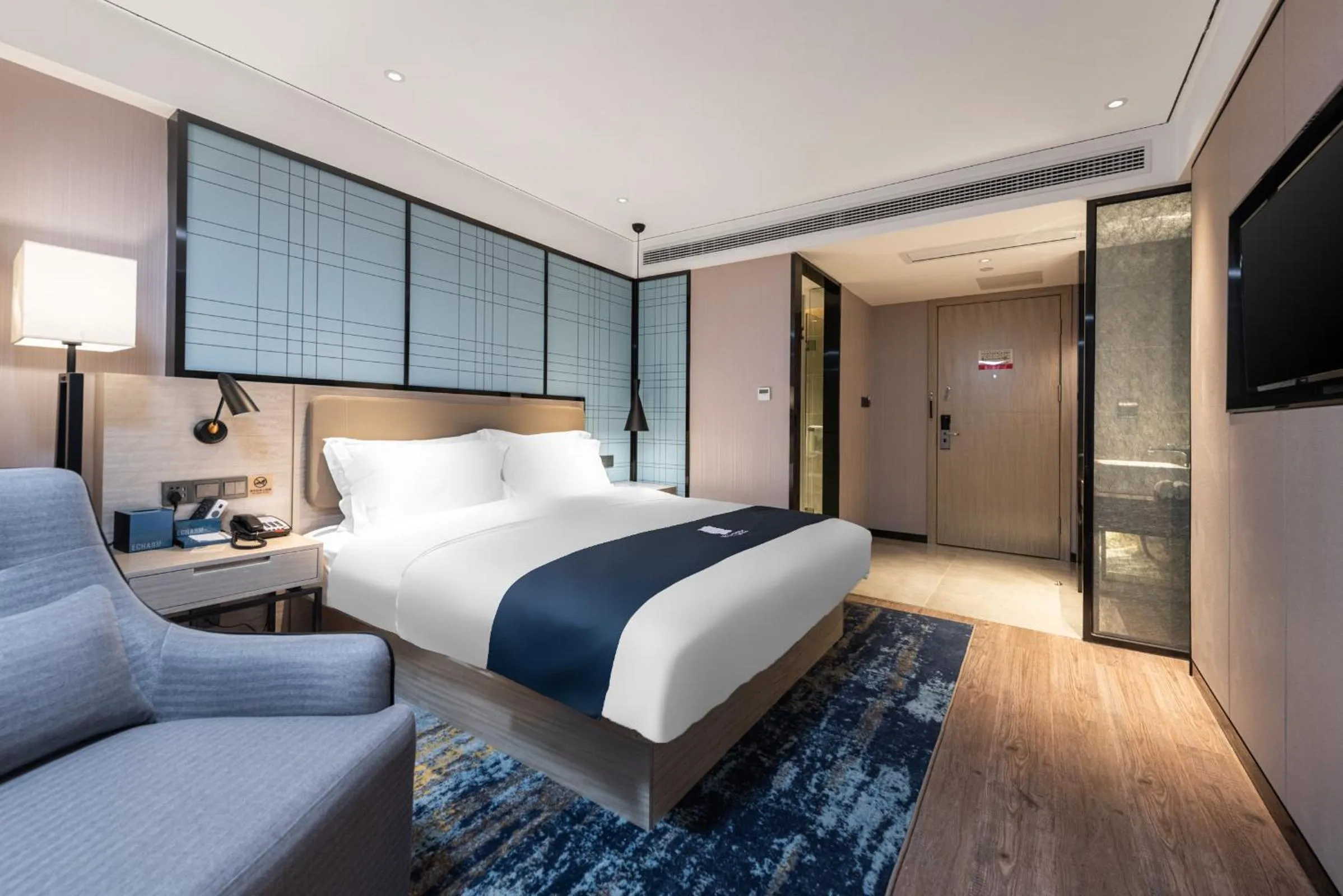 Bed in Echarm Hotel Yangshuo West Stree