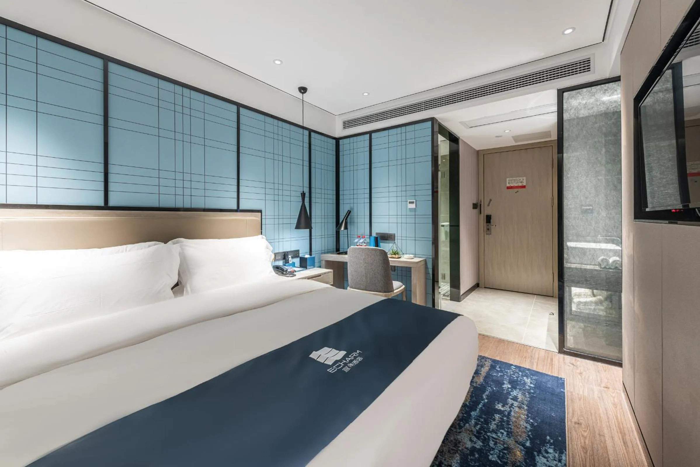 Bed in Echarm Hotel Yangshuo West Stree