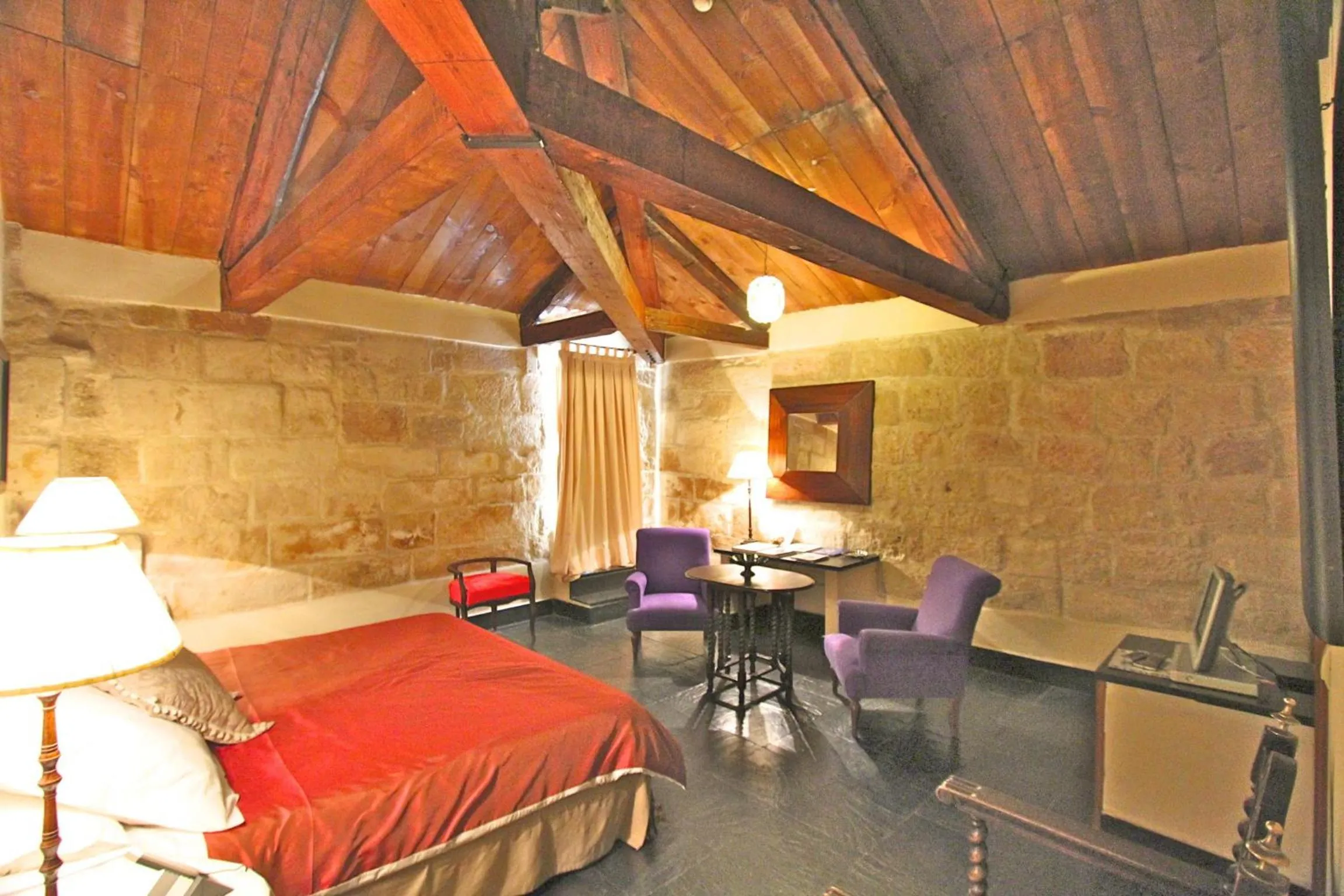 Bed in Posada Real Castillo del Buen Amor