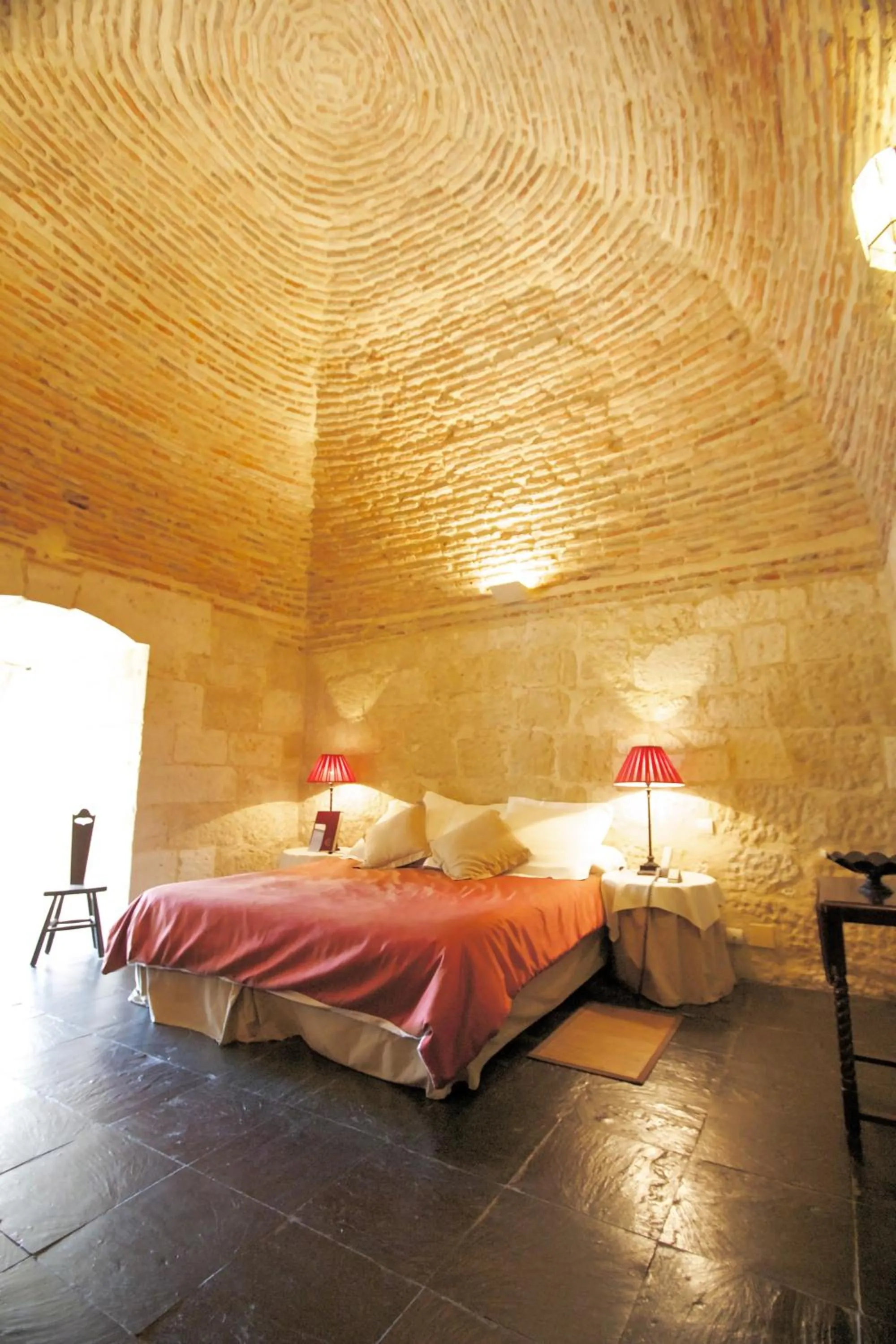 Bed in Posada Real Castillo del Buen Amor