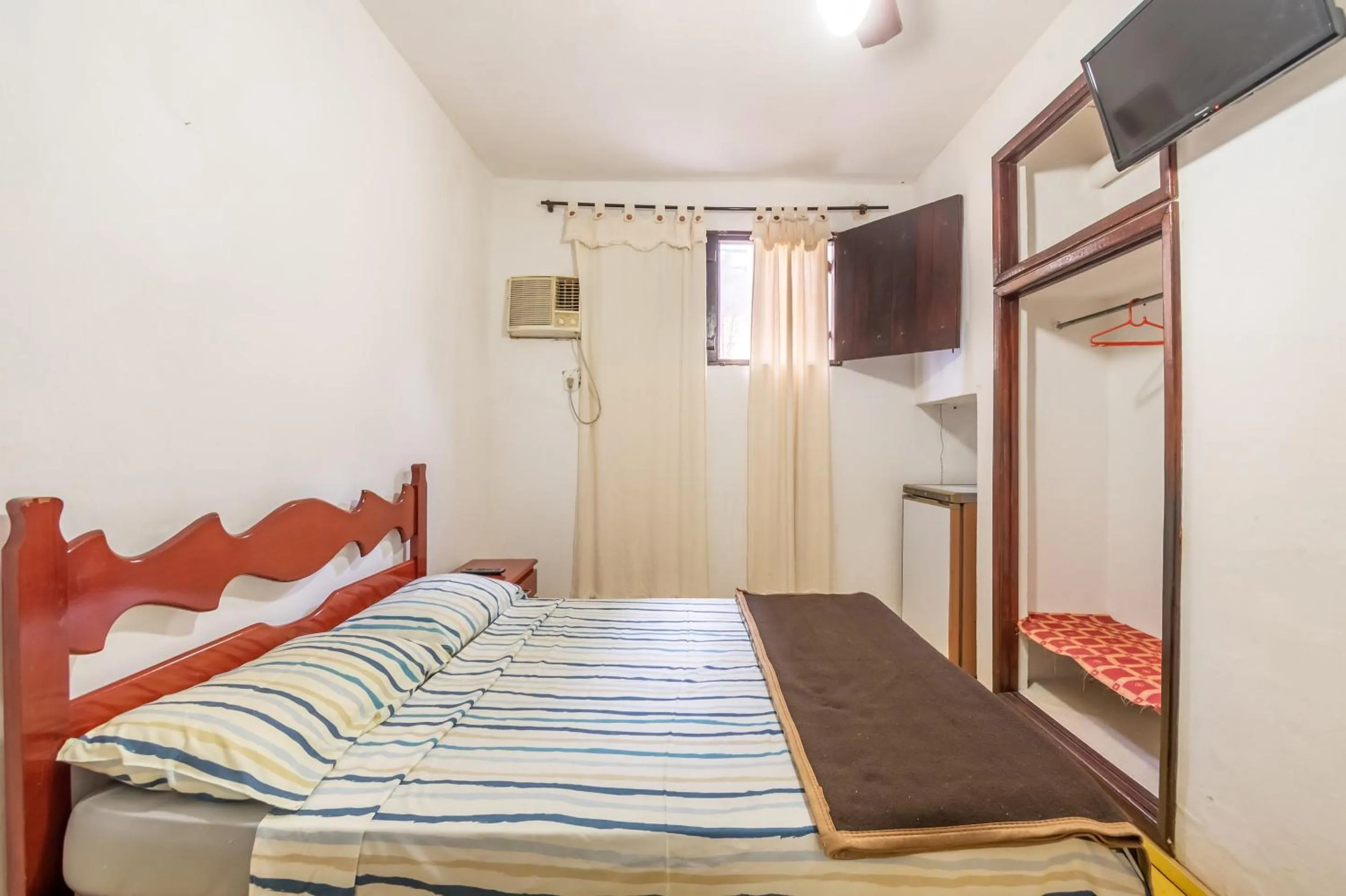 Bedroom, Bed in OYO Residencial Muriqui Apart Hotel, Mangaratiba