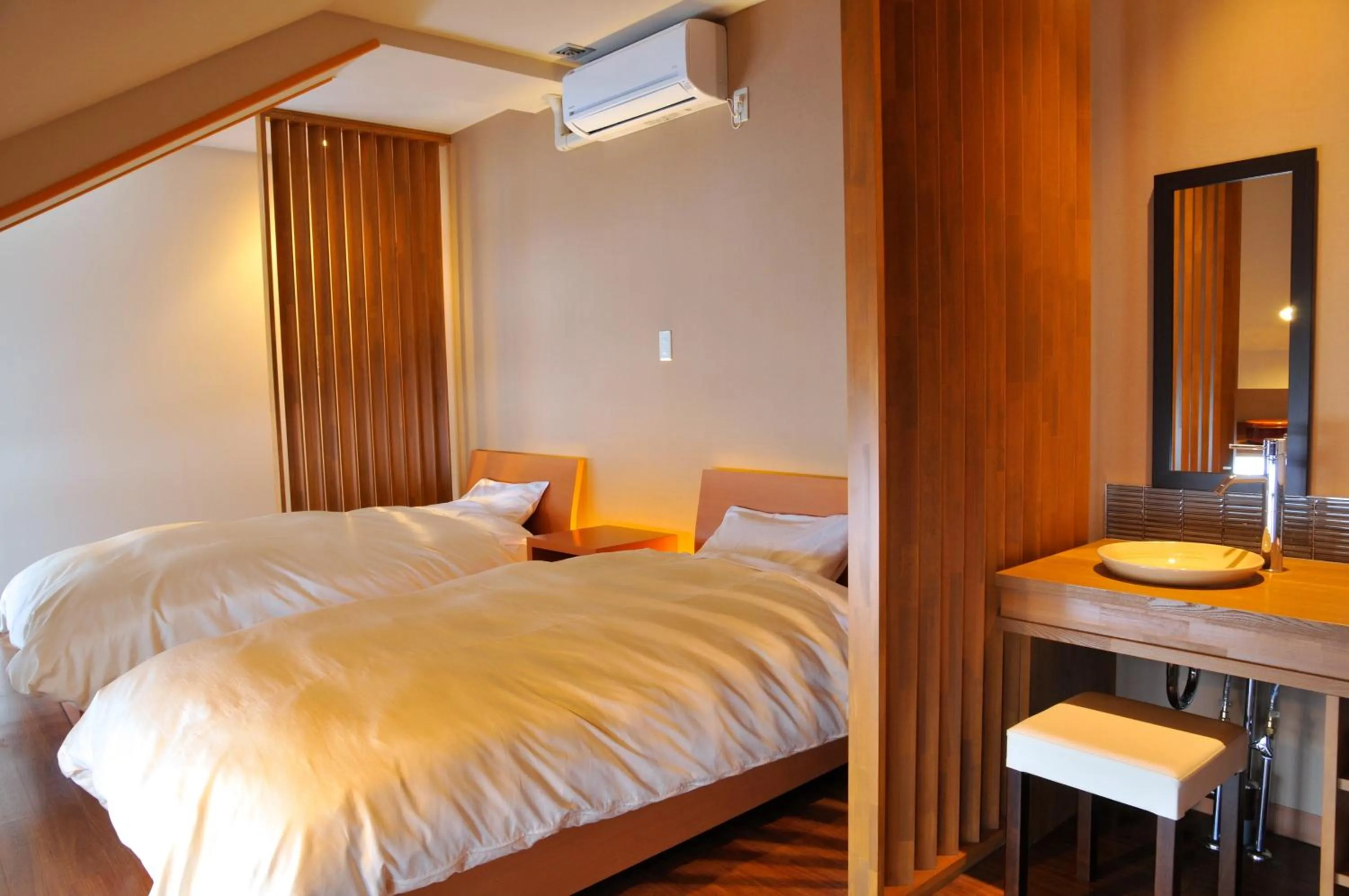 Bed in Maruyama Onsen Kojyokan