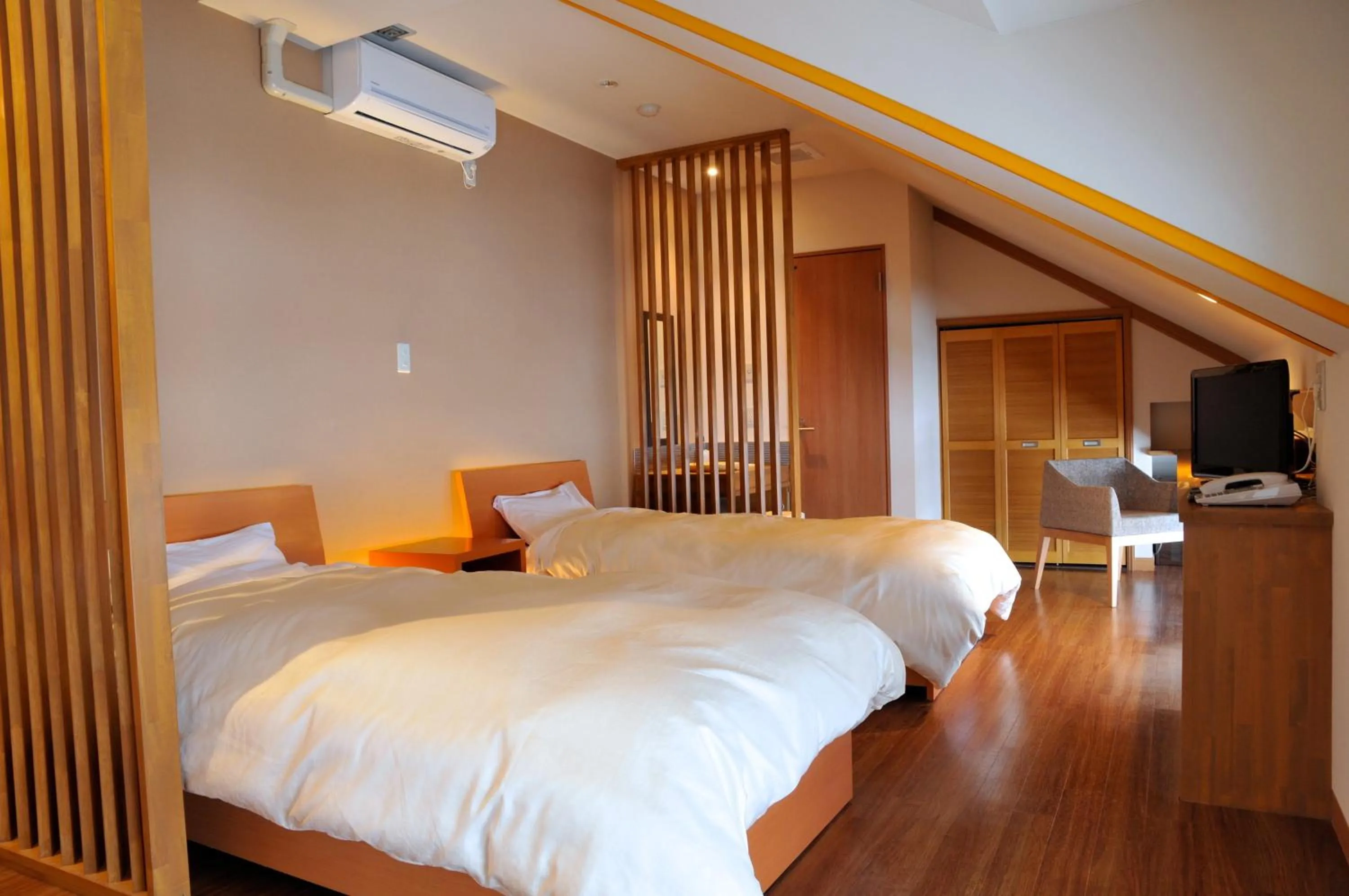 Bed in Maruyama Onsen Kojyokan