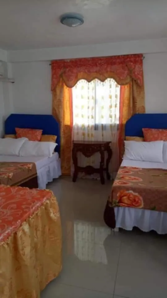 Bed in Isla Paraiso Resort-Hotel