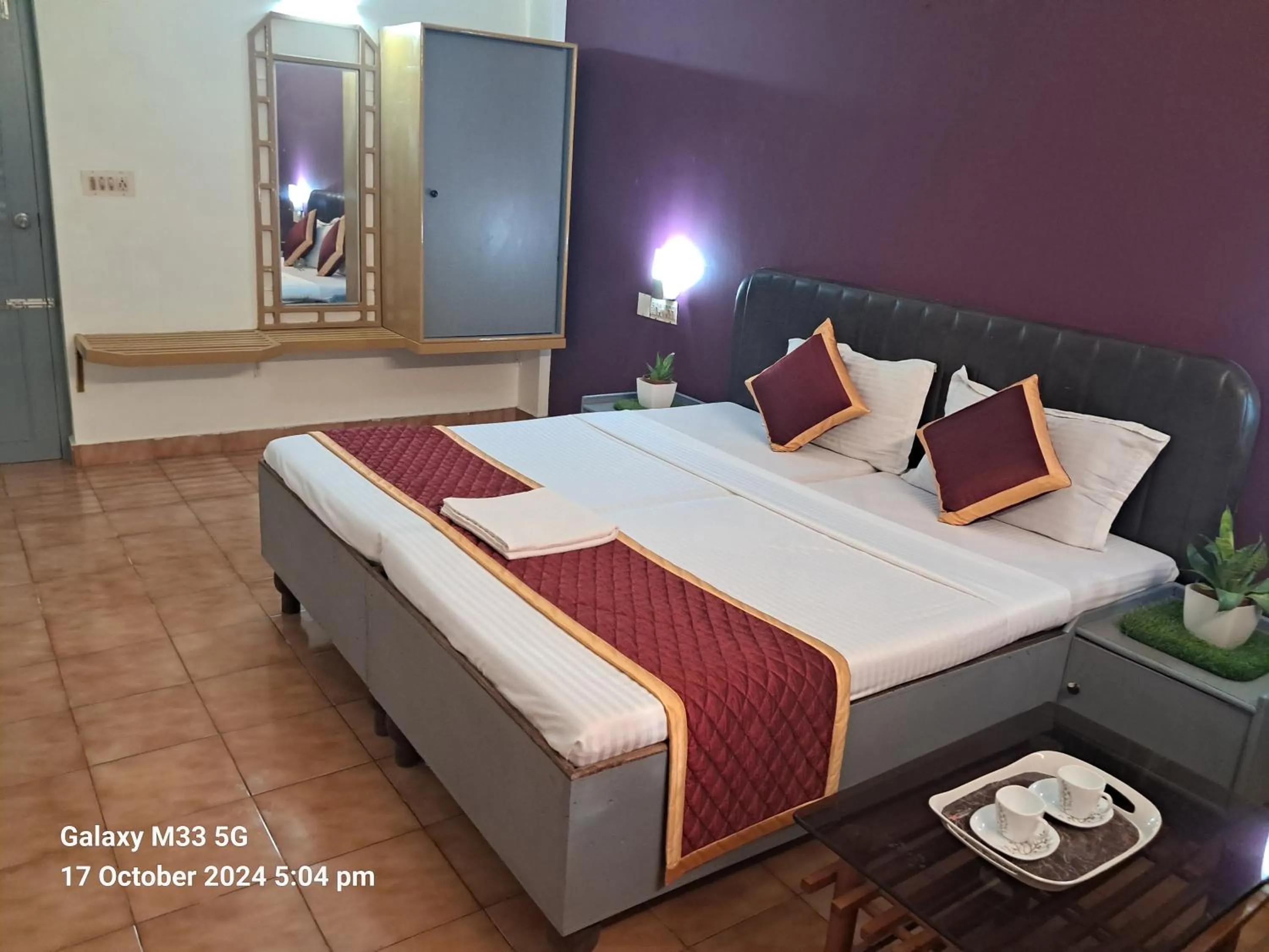 Bed in Grand Harmony Beach Resort