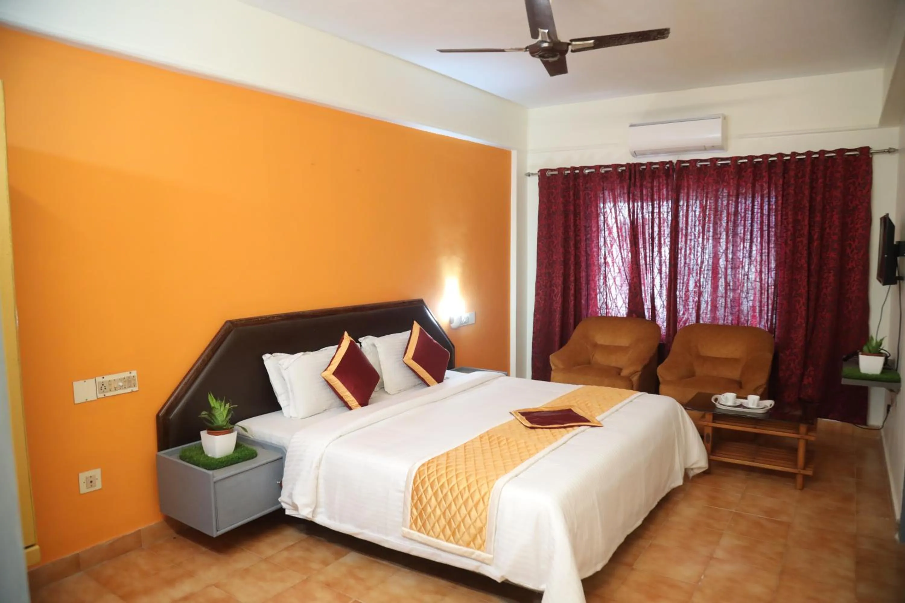 Bed in Grand Harmony Beach Resort