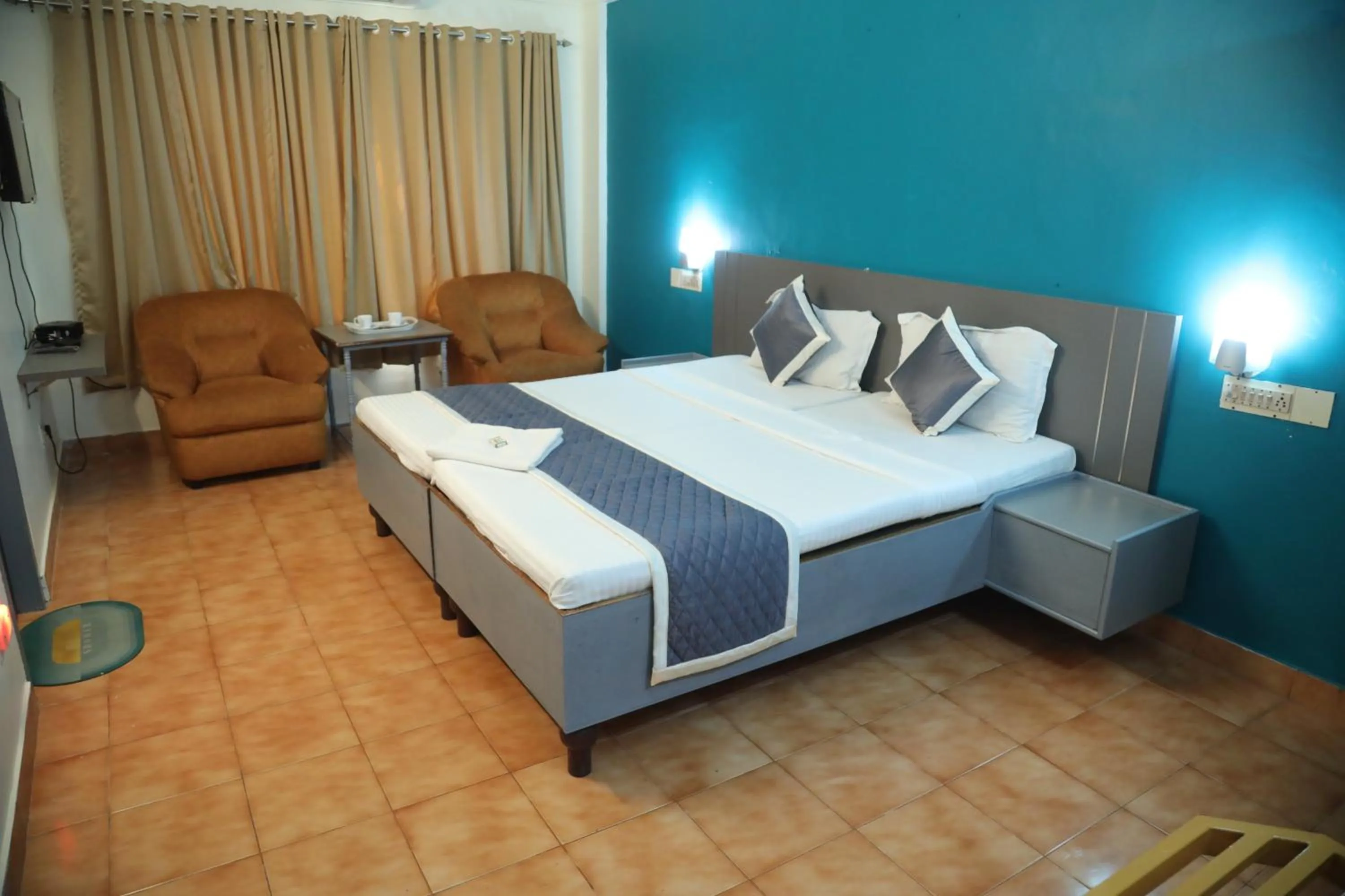Bed in Grand Harmony Beach Resort
