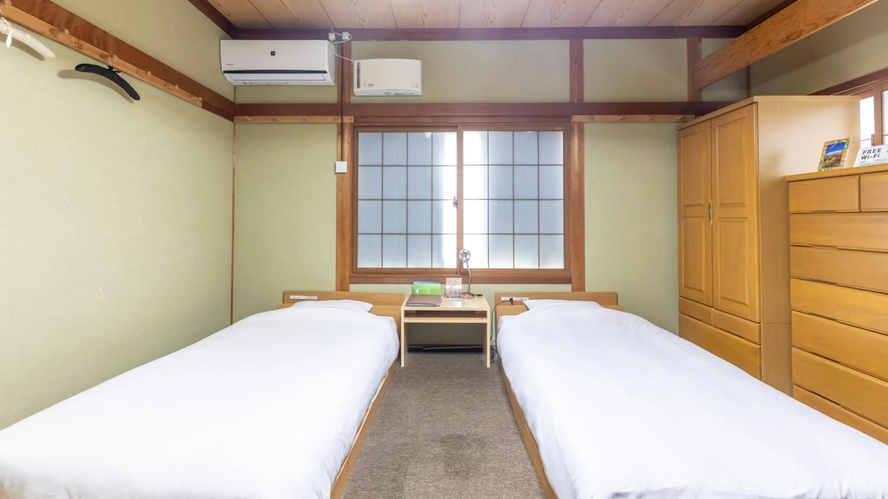 Bed in Tabist International Hotel Kaike