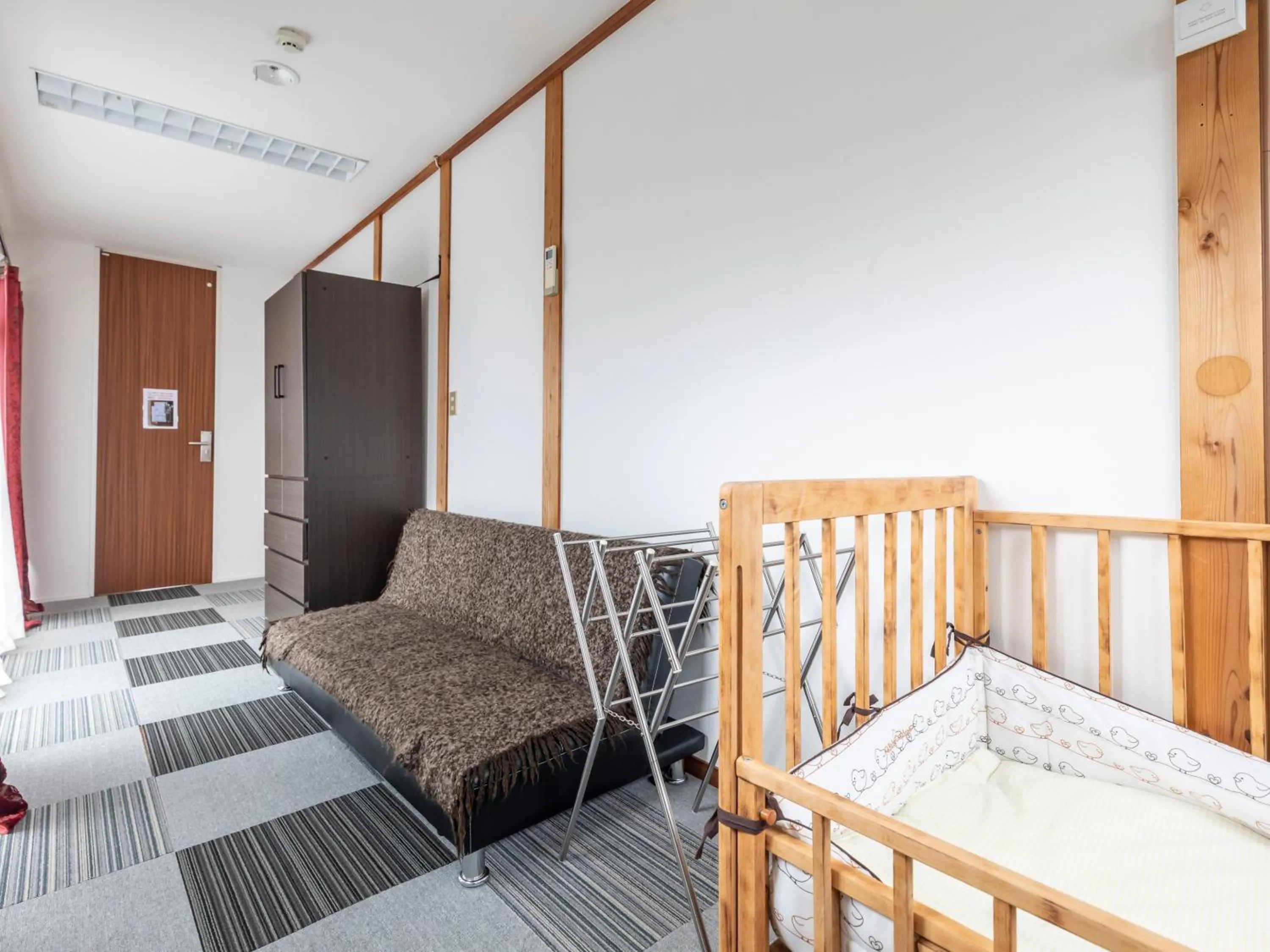 Bed in Tabist International Hotel Kaike