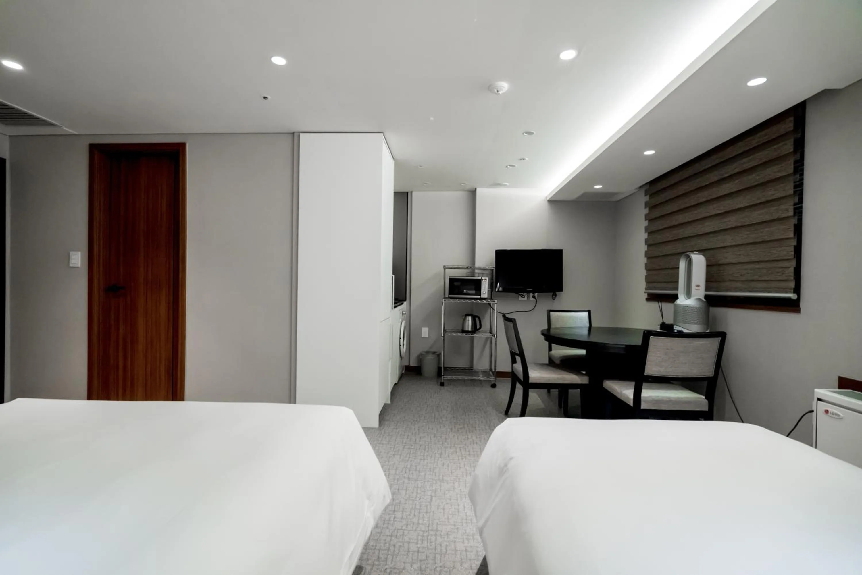Bed in Oriens Hotel & Residences Myeongdong