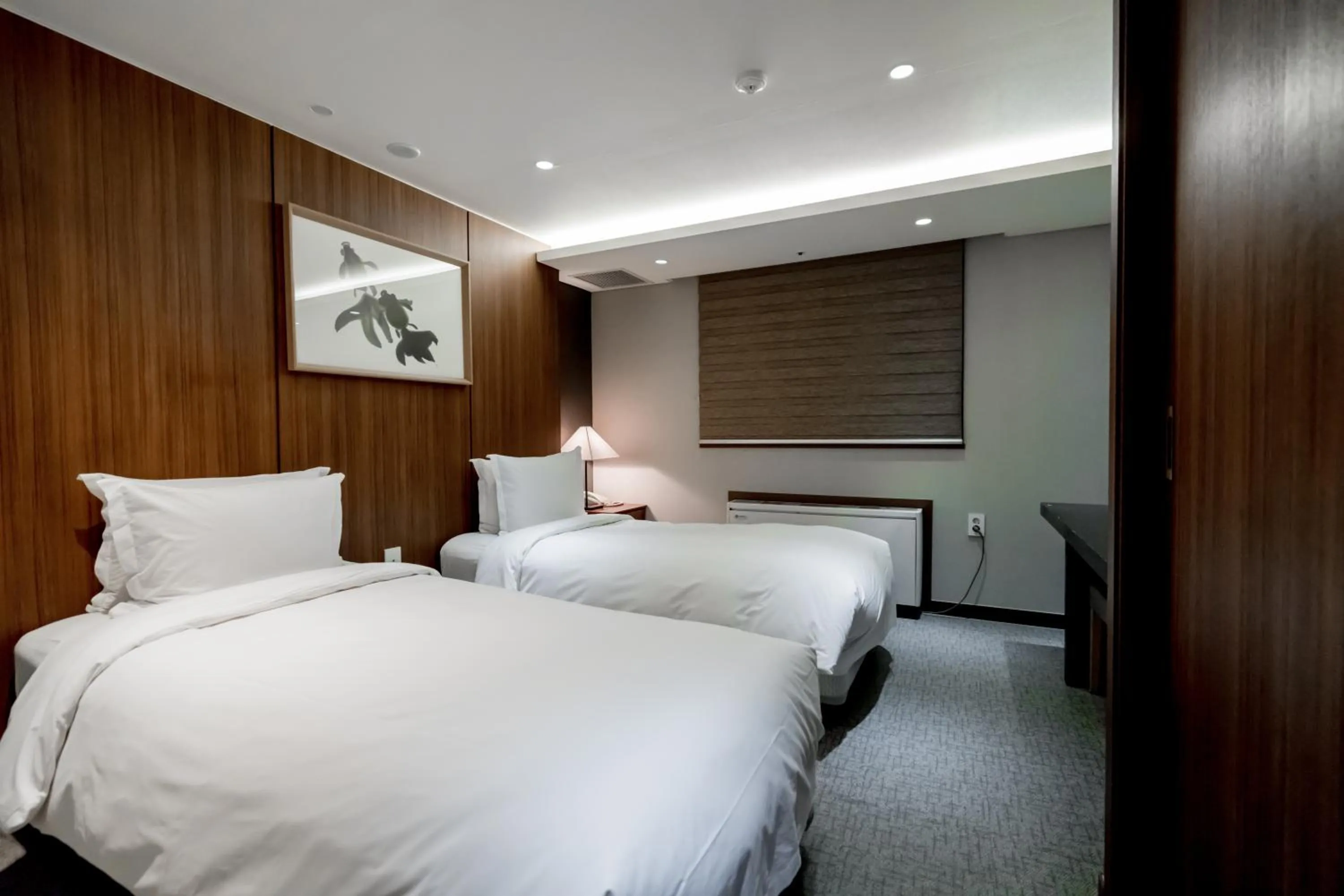 Bed in Oriens Hotel & Residences Myeongdong
