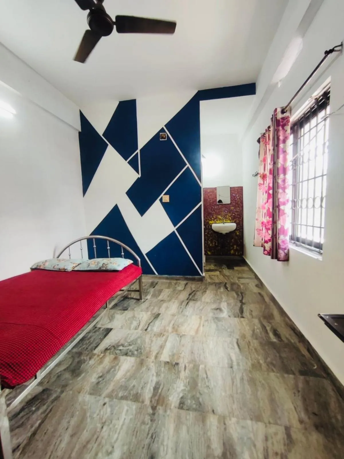 Bedroom in Omega Tourist Home