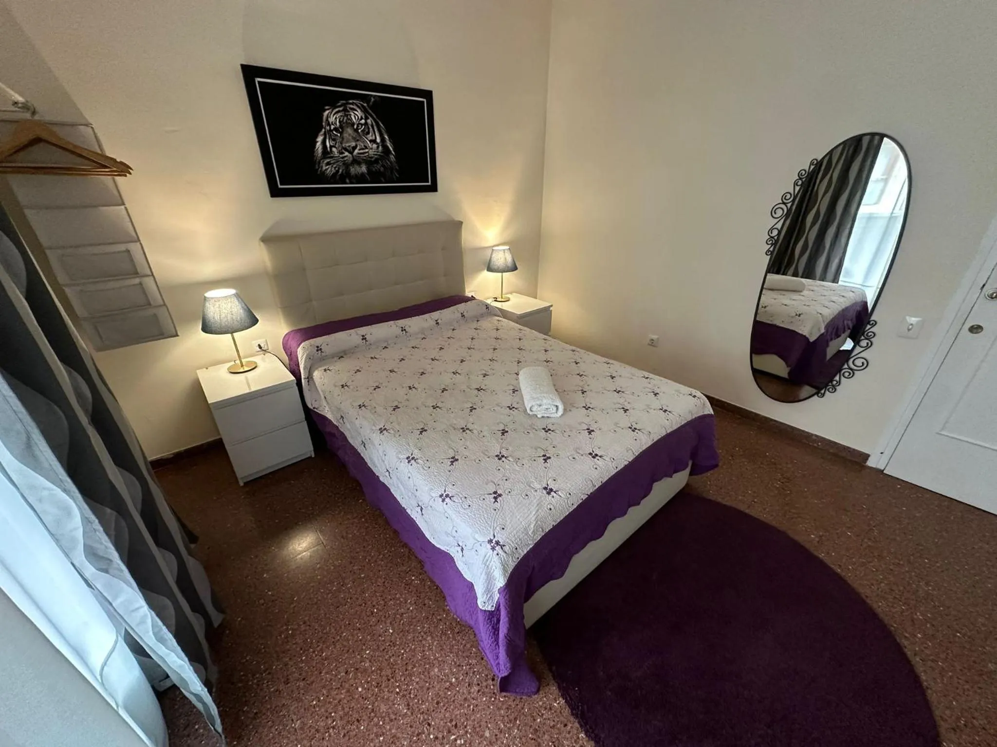 Bed in Viladomat Rooms