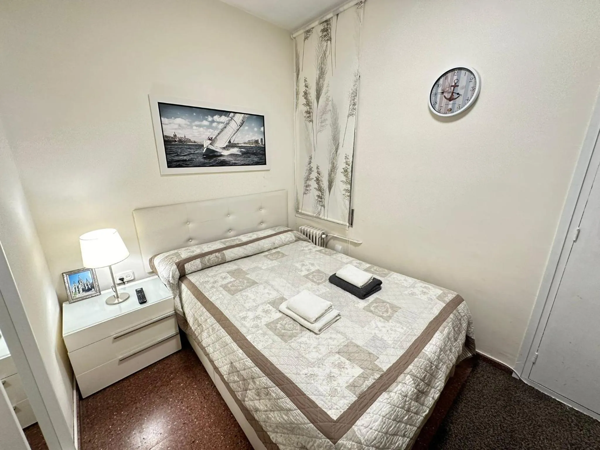 Bed in Viladomat Rooms