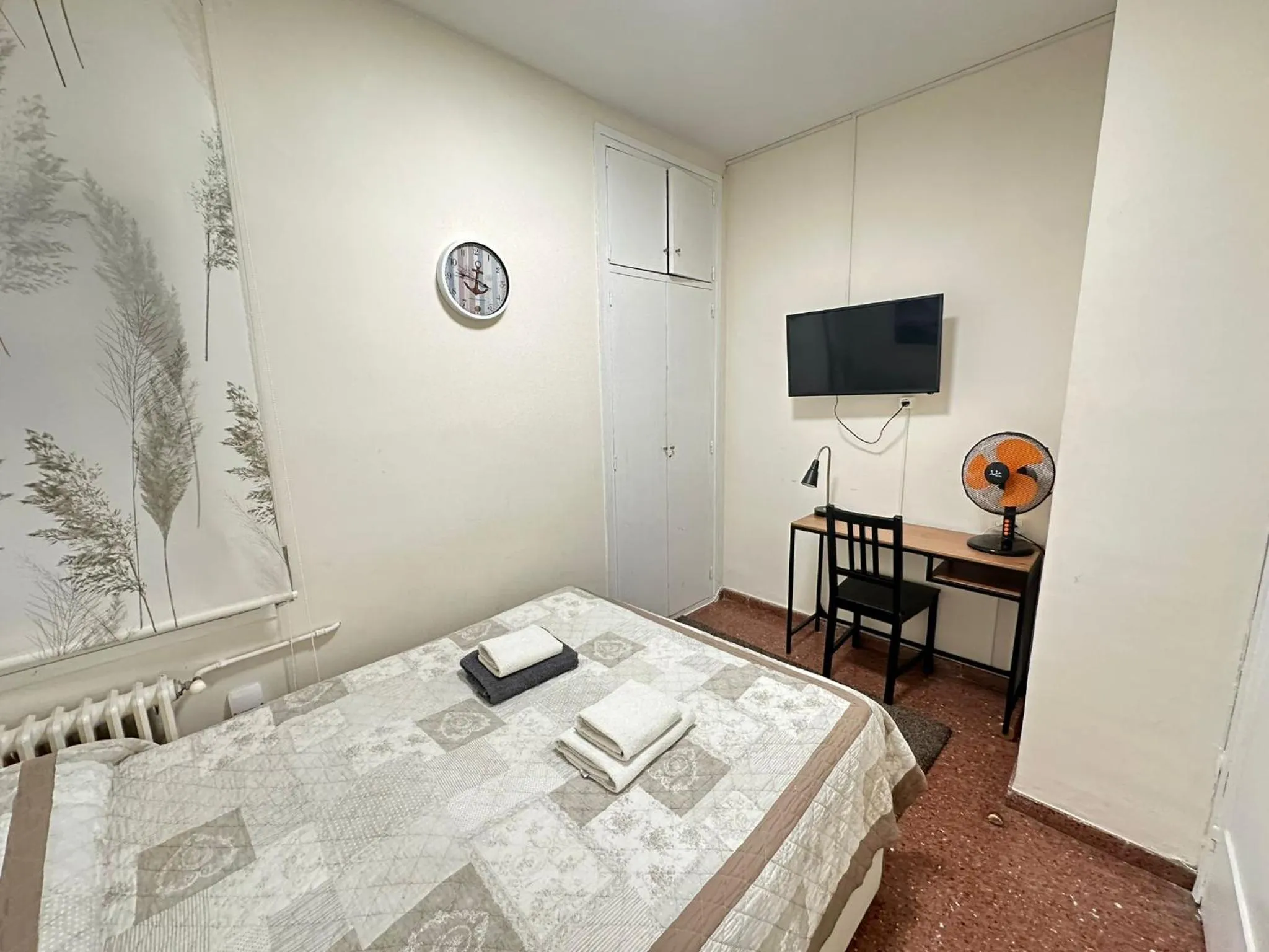 Bed in Viladomat Rooms