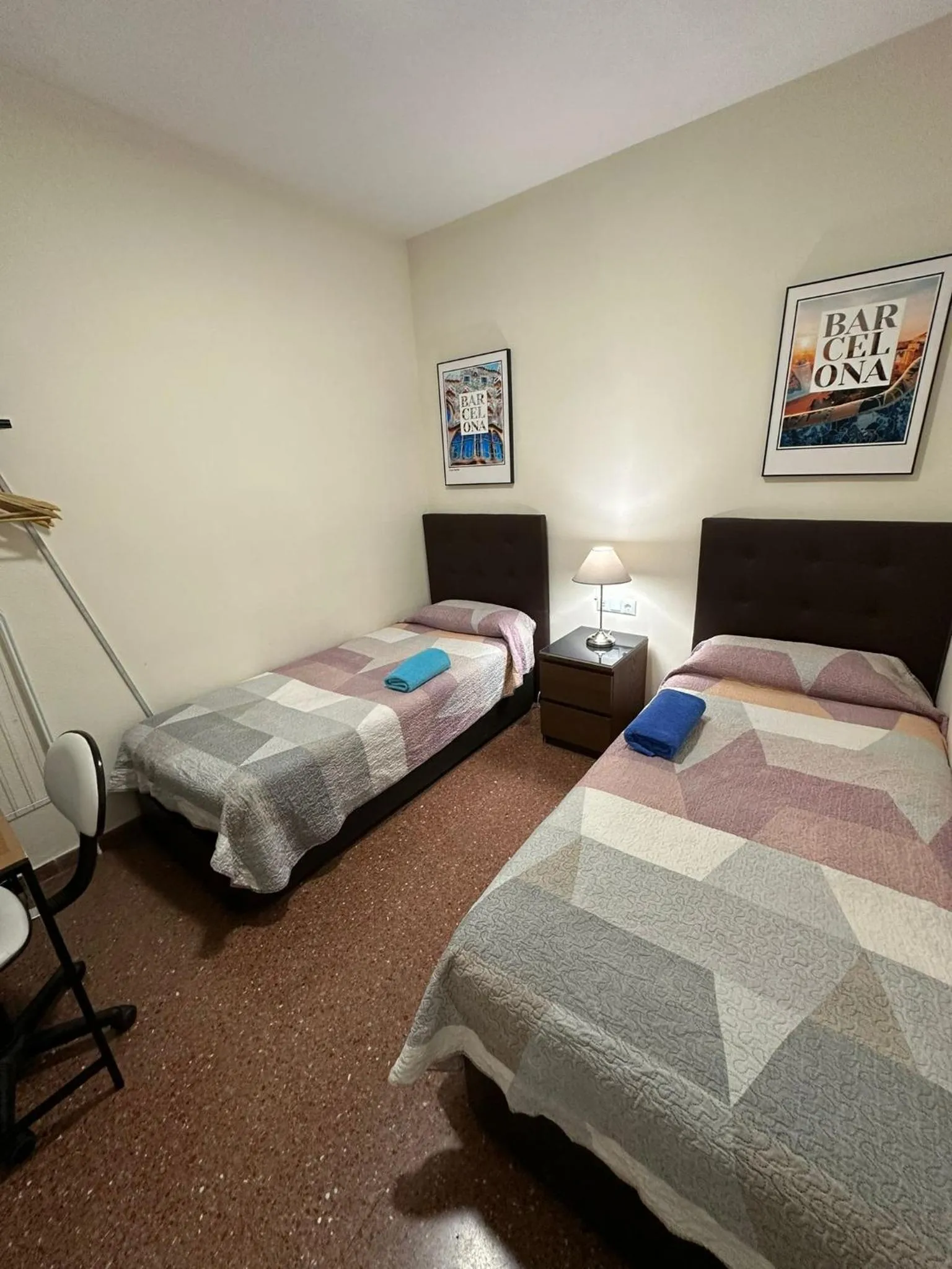 Bed in Viladomat Rooms