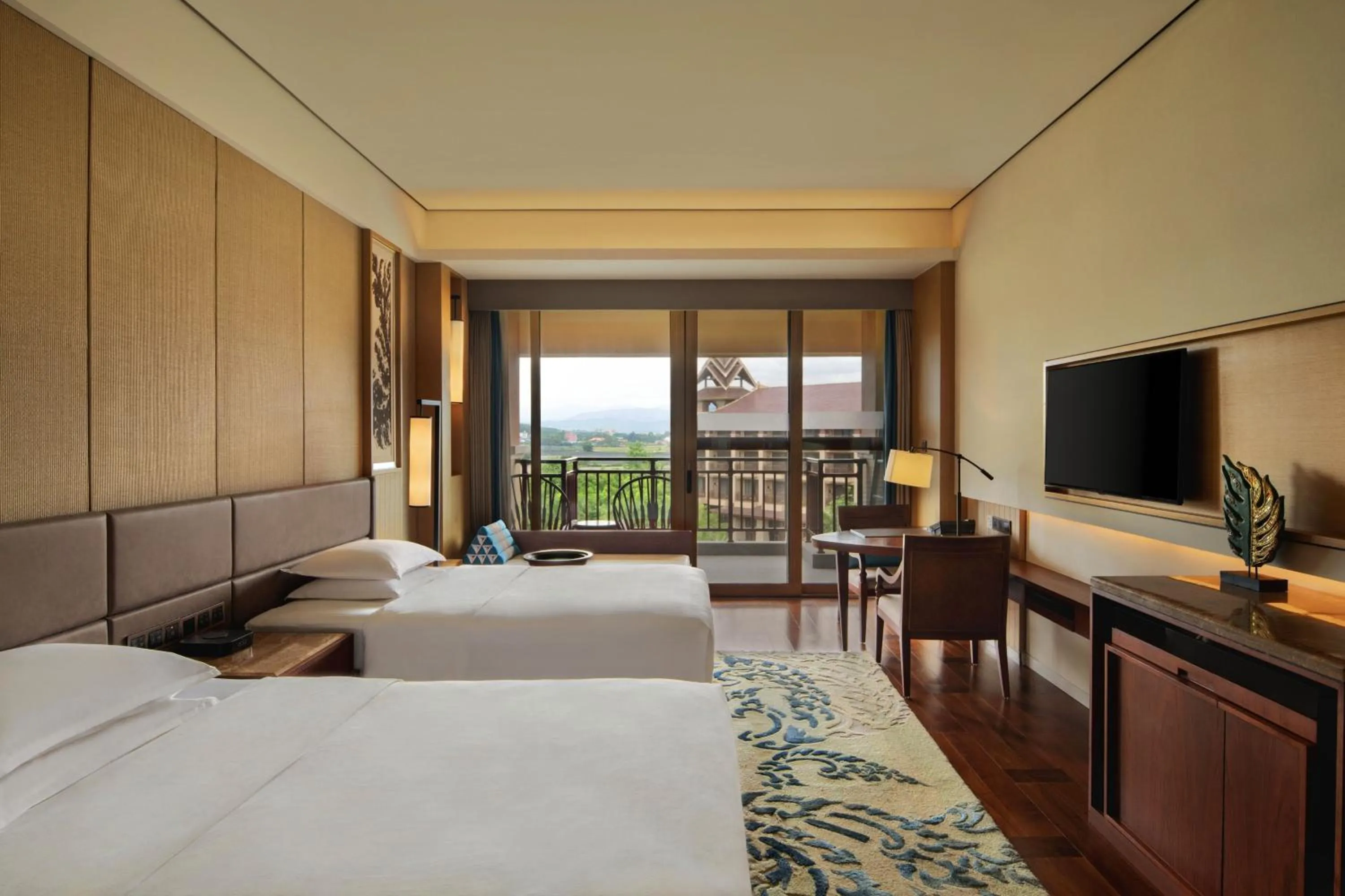 Photo of the whole room, Bed in Sheraton Grand Xishuangbanna Hotel
