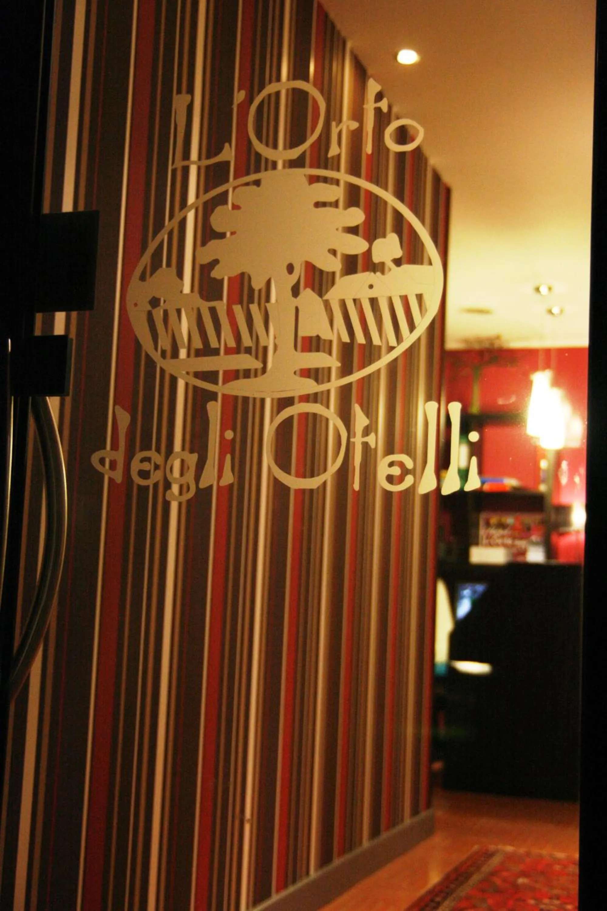 Property logo or sign in Hotel L' Orto degli Otelli