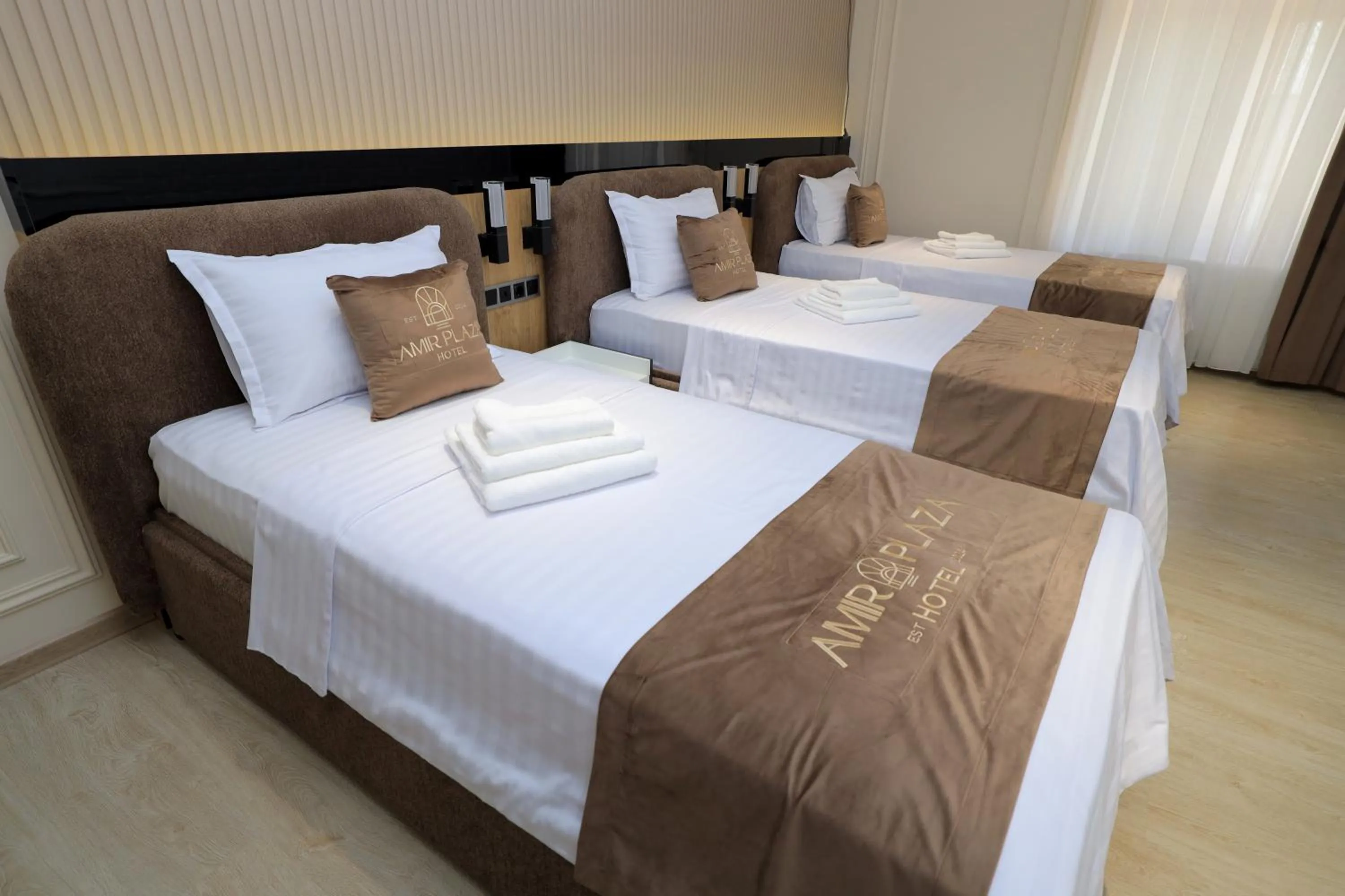 Bed in AMIR PLAZA hotel