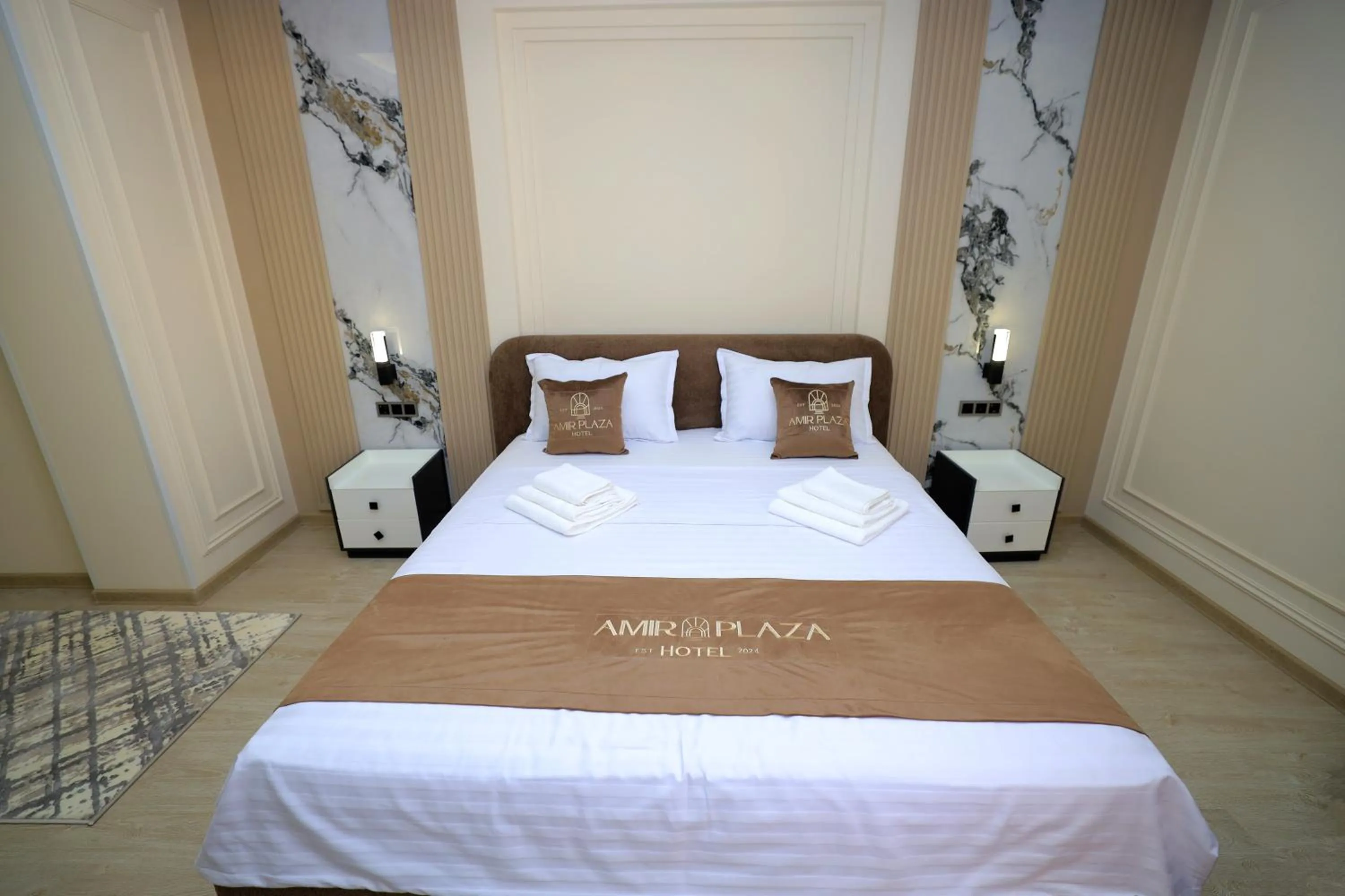 Bed in AMIR PLAZA hotel