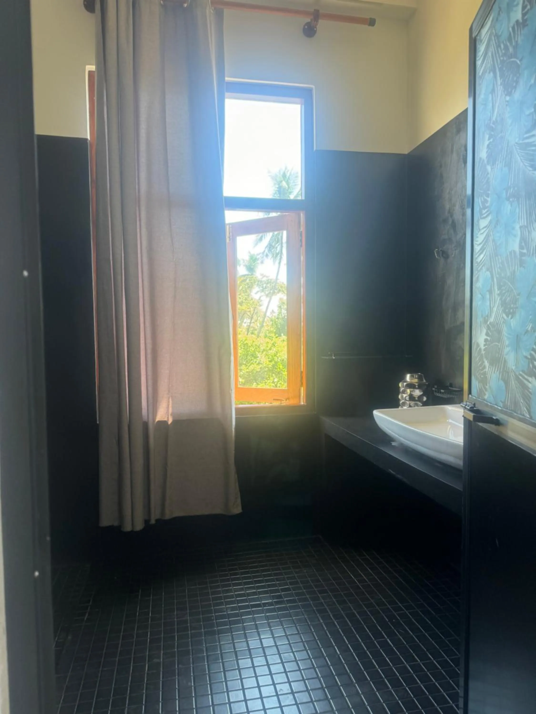 Bathroom in Coconut Palm beach restaurant and rooms